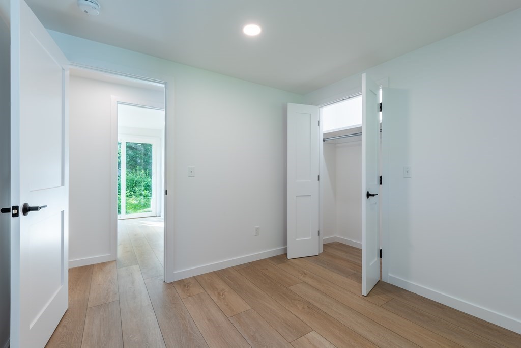 90 Memorial Drive Amherst, MA 01002 - Photo 20 of 38 wooden floor in an empty room