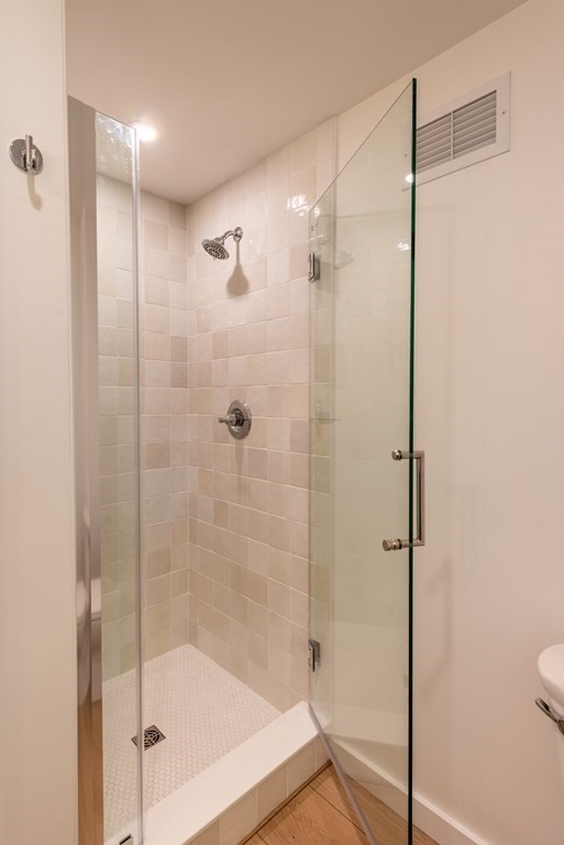 90 Memorial Drive Amherst, MA 01002 - Photo 25 of 38 a bathroom with a shower and toilet