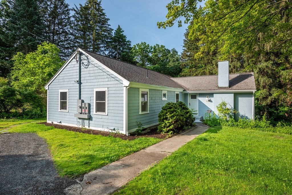 90 Memorial Drive Amherst, MA 01002 - Photo 38 of 38 a front view of house with yard and green space