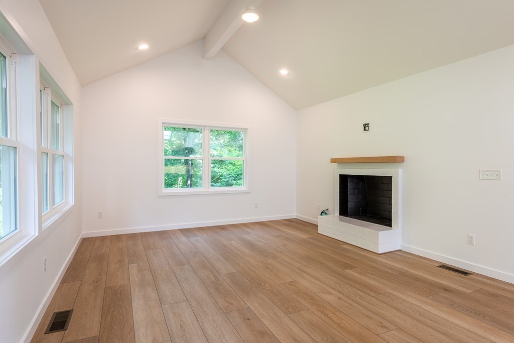 90 Memorial Drive Amherst, MA 01002 - Photo 7 of 38 wooden floor in an empty room with a window