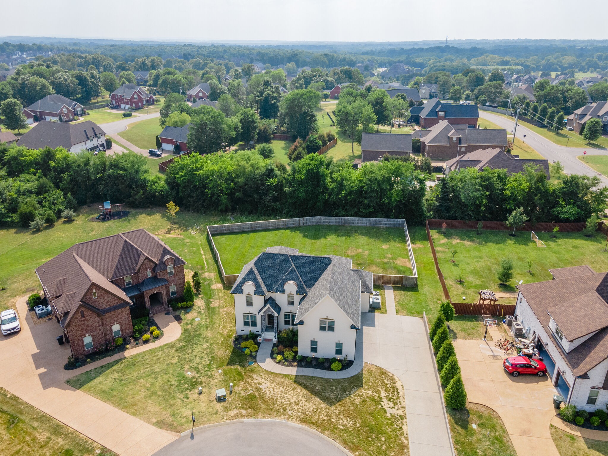 2002 Beechhaven Cir Mount Mount Juliet, TN 37122 - Photo 14 of 57 an aerial view of a swimming pool with a garden and plants