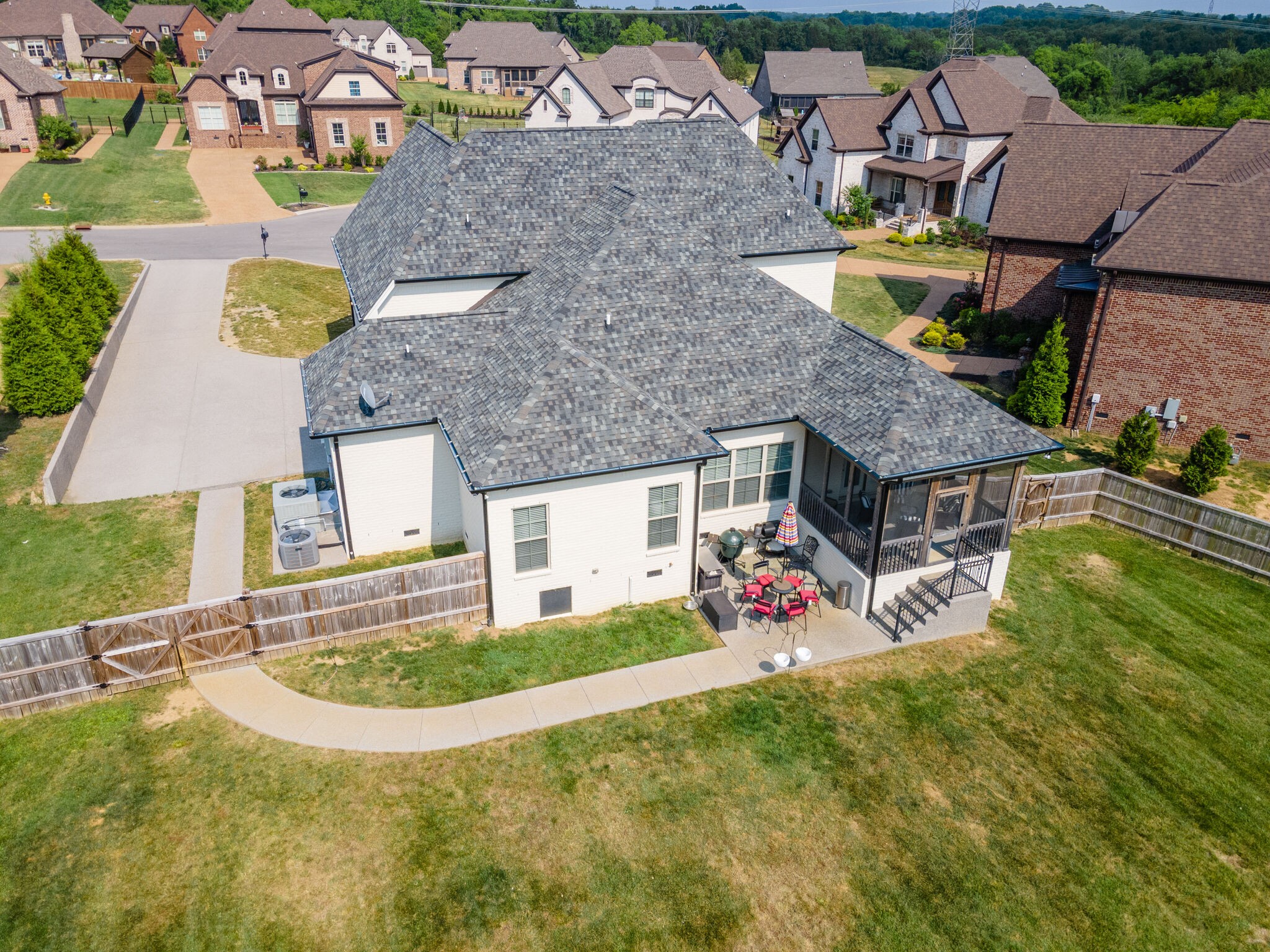 2002 Beechhaven Cir Mount Mount Juliet, TN 37122 - Photo 15 of 57 an aerial view of a house with swimming pool and large trees