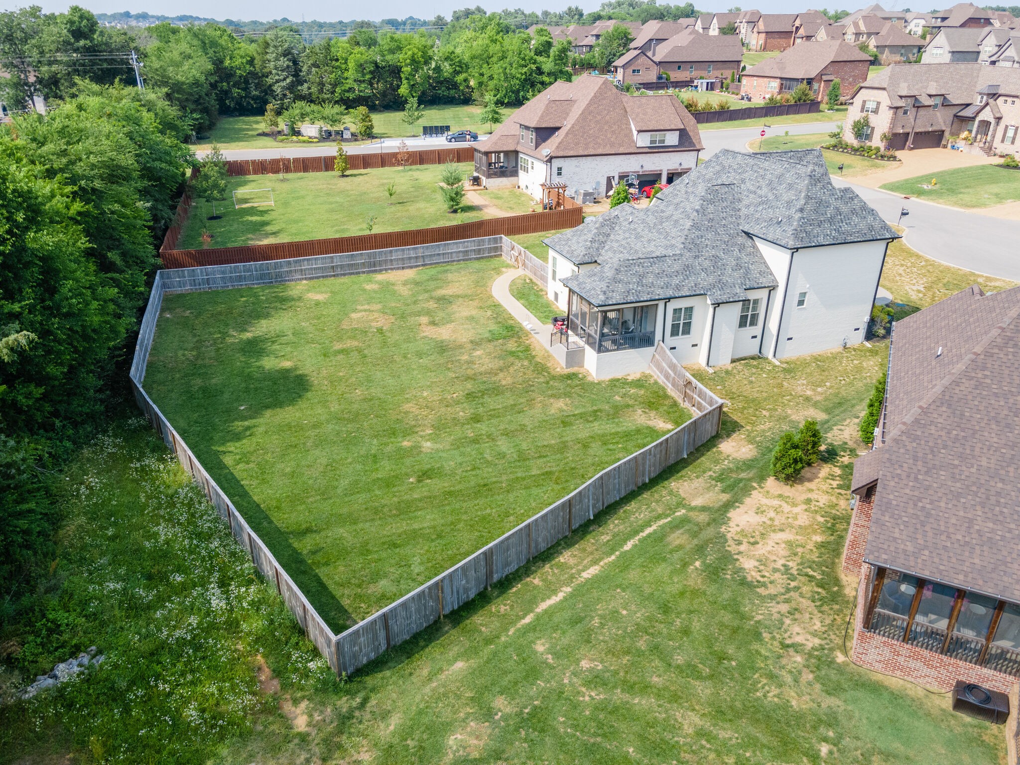 2002 Beechhaven Cir Mount Mount Juliet, TN 37122 - Photo 16 of 57 an aerial view of residential houses with outdoor space and swimming pool