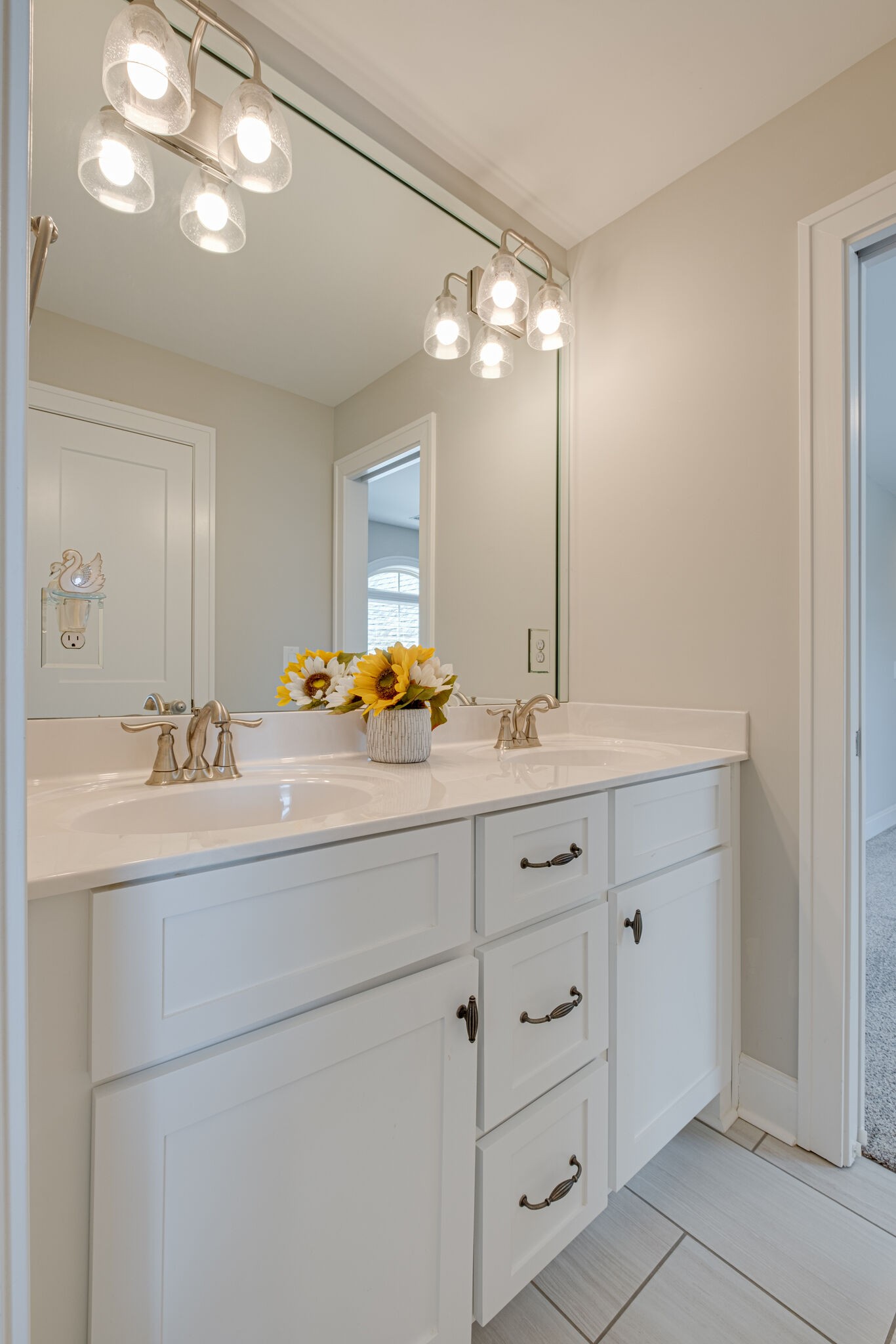 2002 Beechhaven Cir Mount Mount Juliet, TN 37122 - Photo 46 of 57 a bathroom with a double vanity sink and a mirror