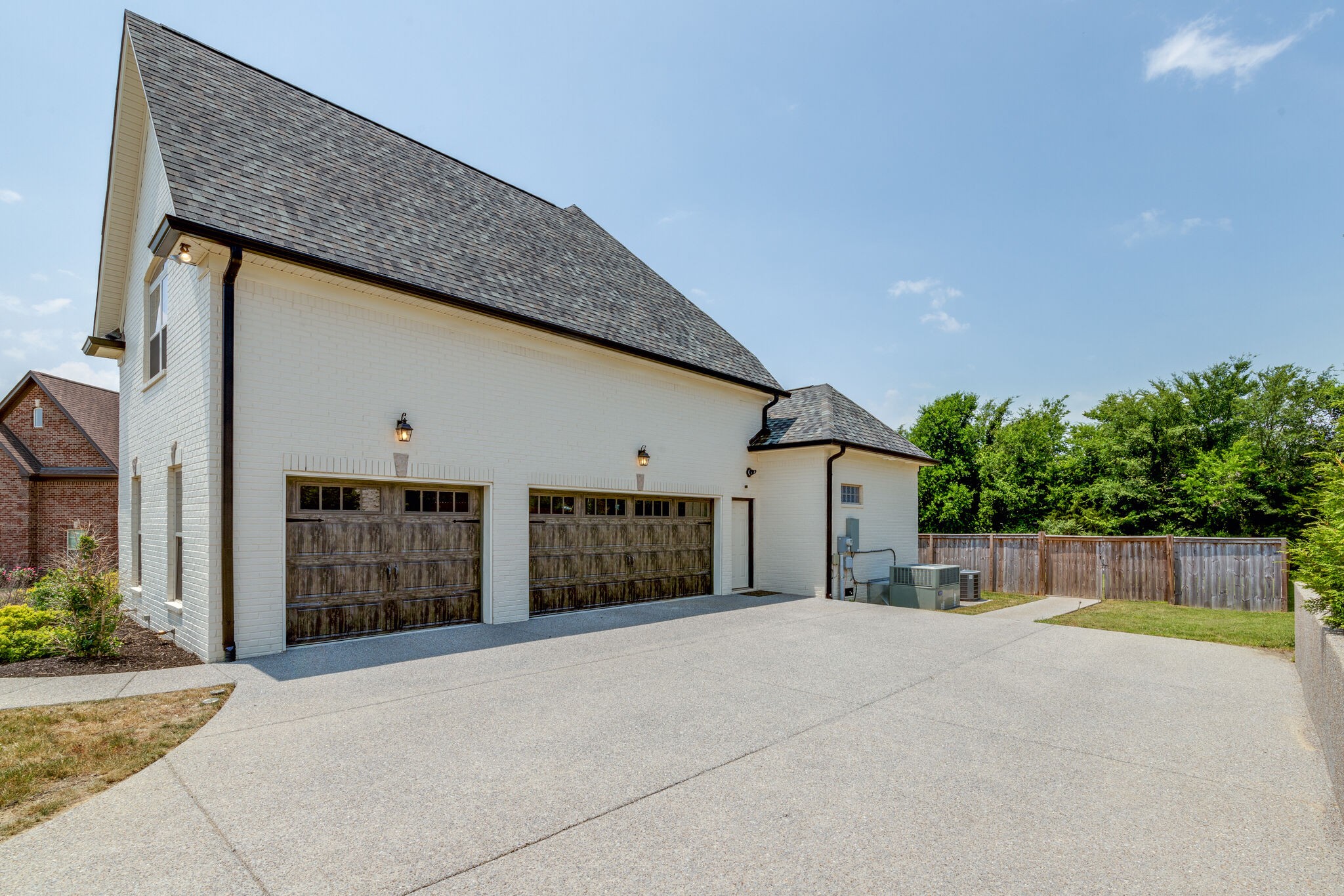 2002 Beechhaven Cir Mount Mount Juliet, TN 37122 - Photo 5 of 57 a view of a house with a yard and garage