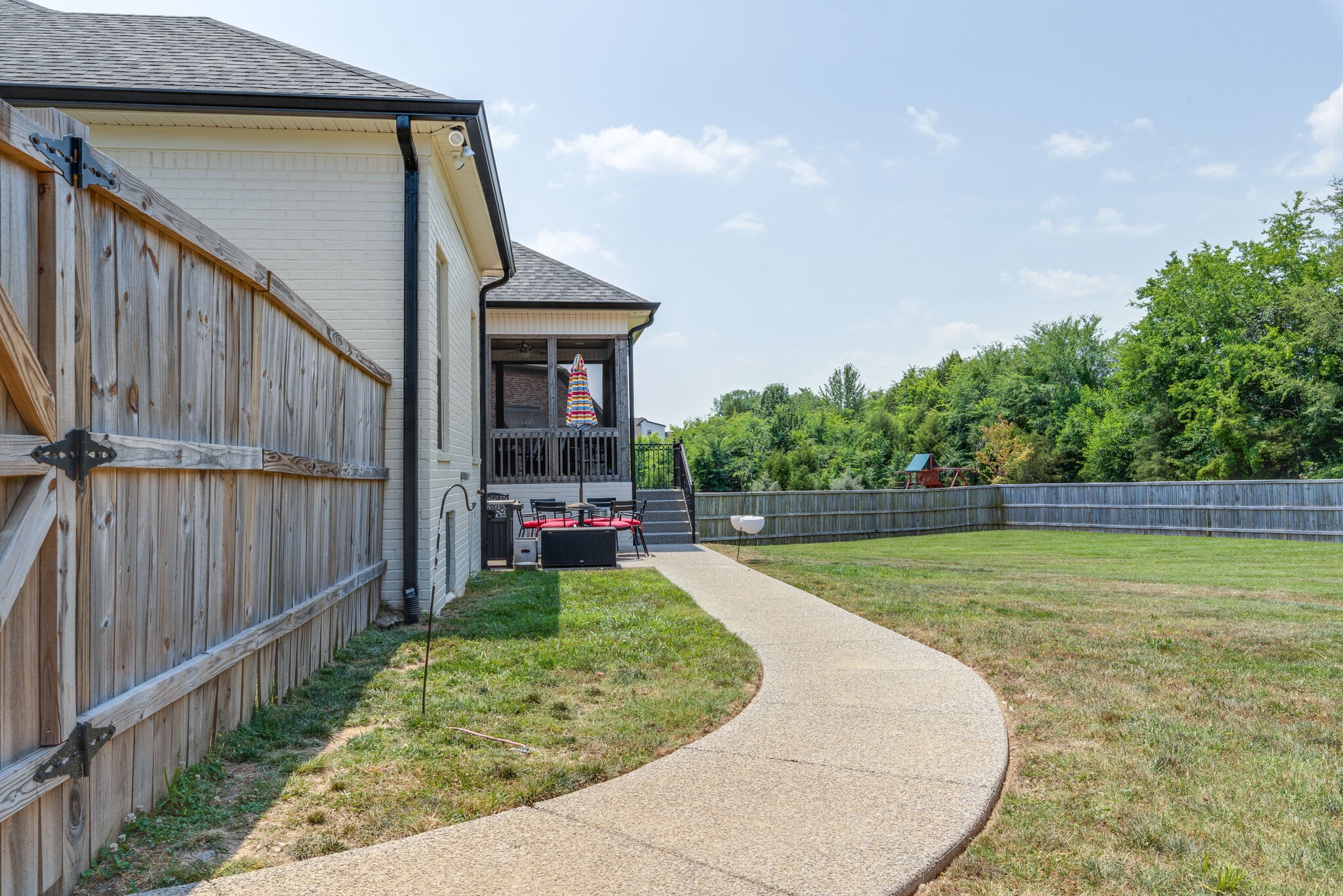 2002 Beechhaven Cir Mount Mount Juliet, TN 37122 - Photo 8 of 57 a view of a backyard with sitting area