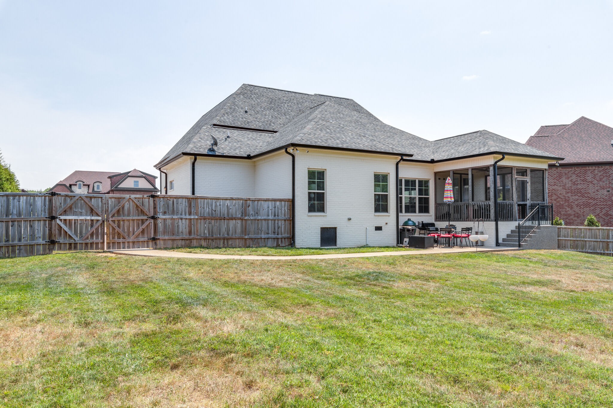 2002 Beechhaven Cir Mount Mount Juliet, TN 37122 - Photo 9 of 57 a view of a house with floor to ceiling windows and a yard