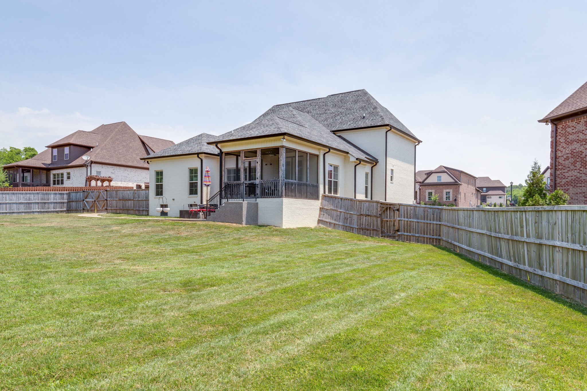 2002 Beechhaven Cir Mount Mount Juliet, TN 37122 - Photo 10 of 57 a view of a house with a big yard and large trees