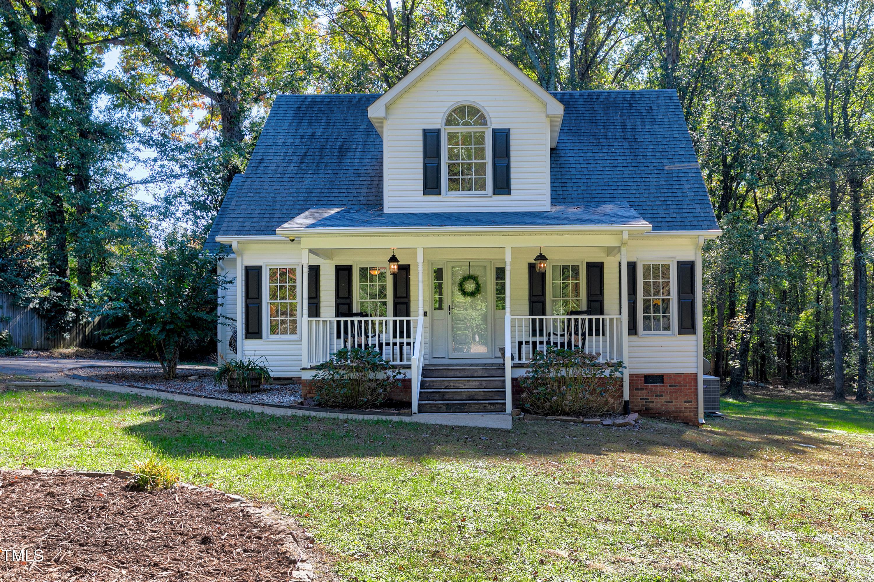 7834 James Austin Road Willow Spring, NC 27592 - Photo 1 of 46 a view of a house with swimming pool next to a yard