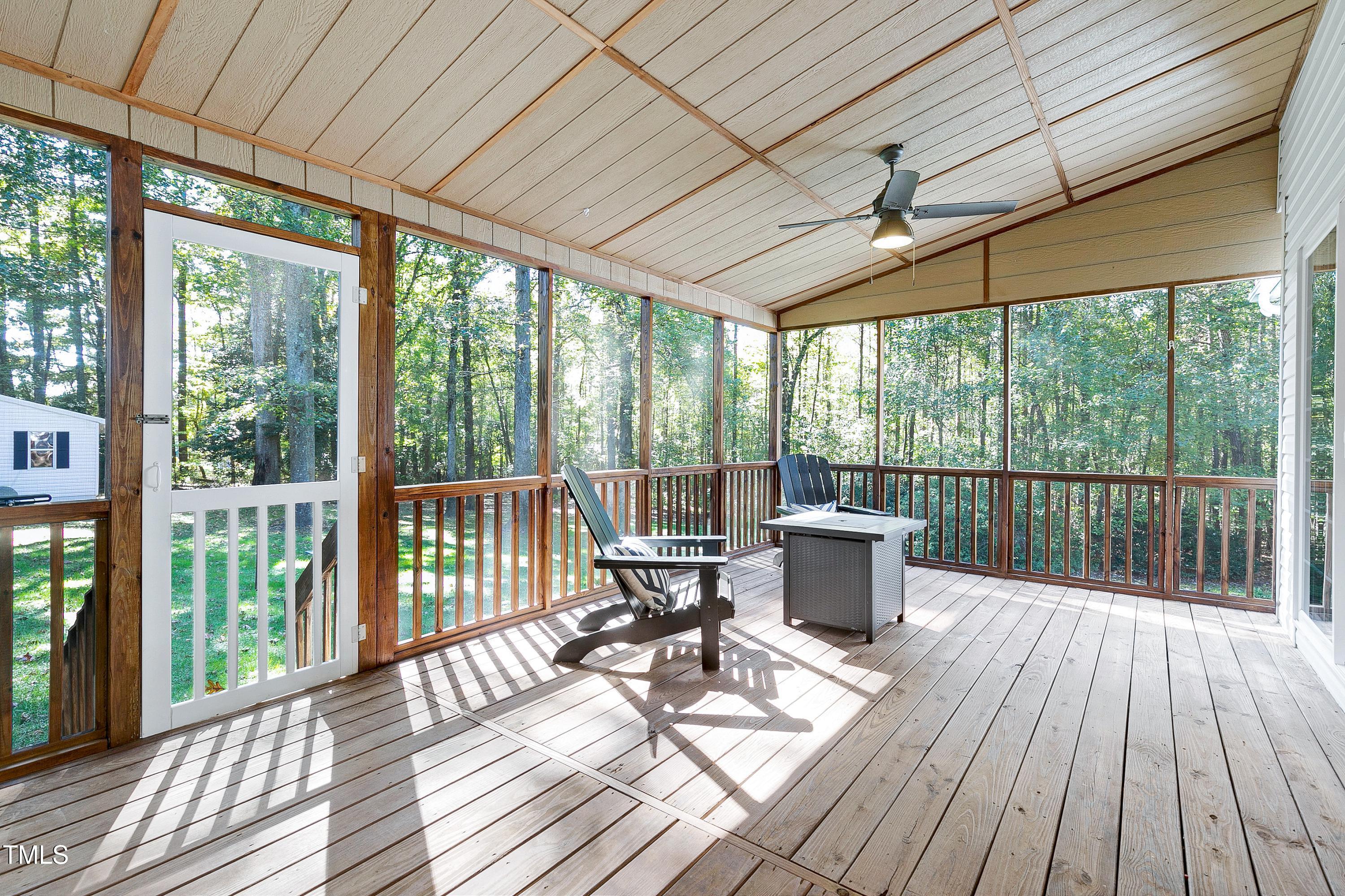 7834 James Austin Road Willow Spring, NC 27592 - Photo 34 of 46 a view of a patio with wooden floor