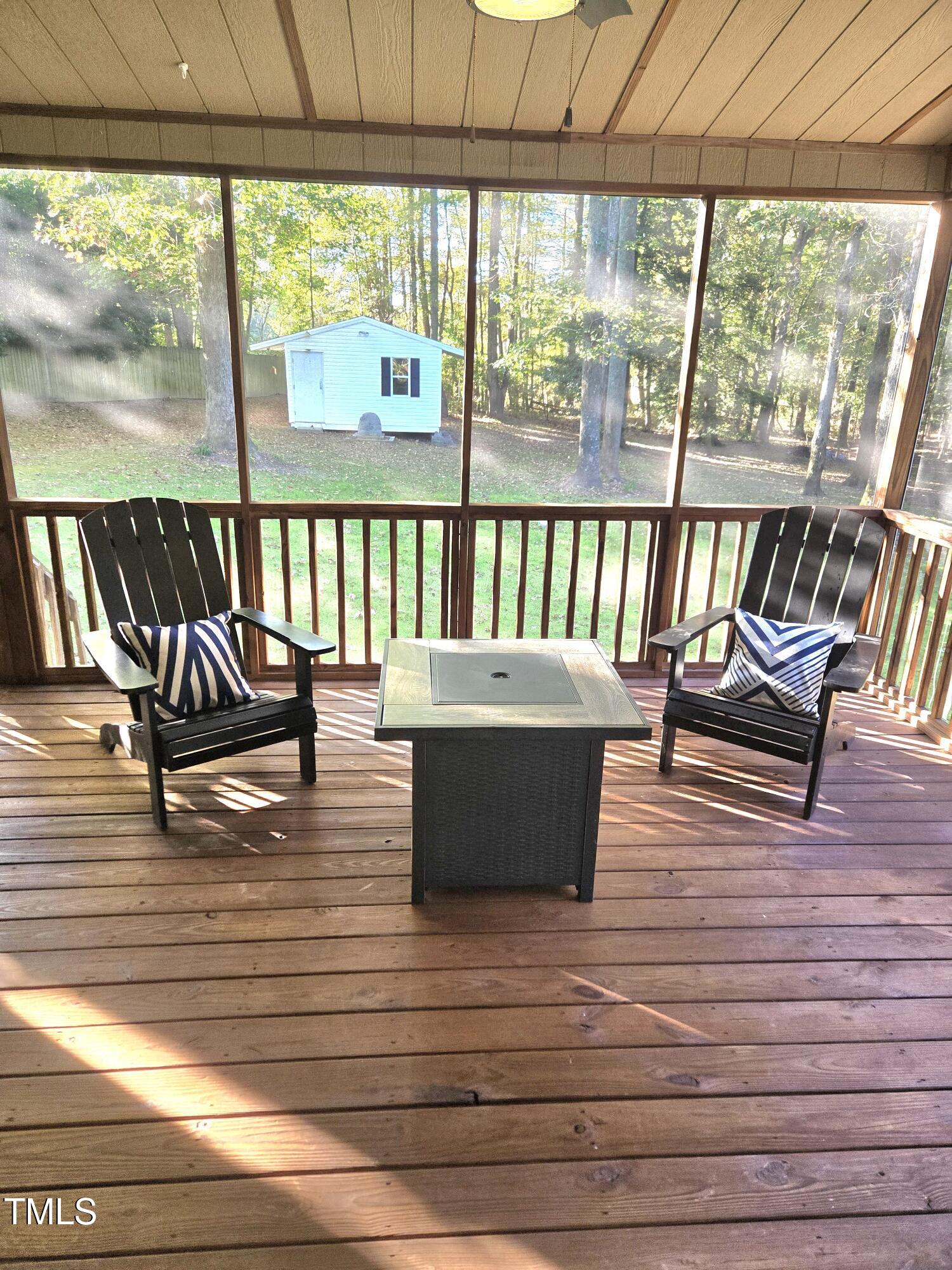 7834 James Austin Road Willow Spring, NC 27592 - Photo 35 of 46 a living room with large windows