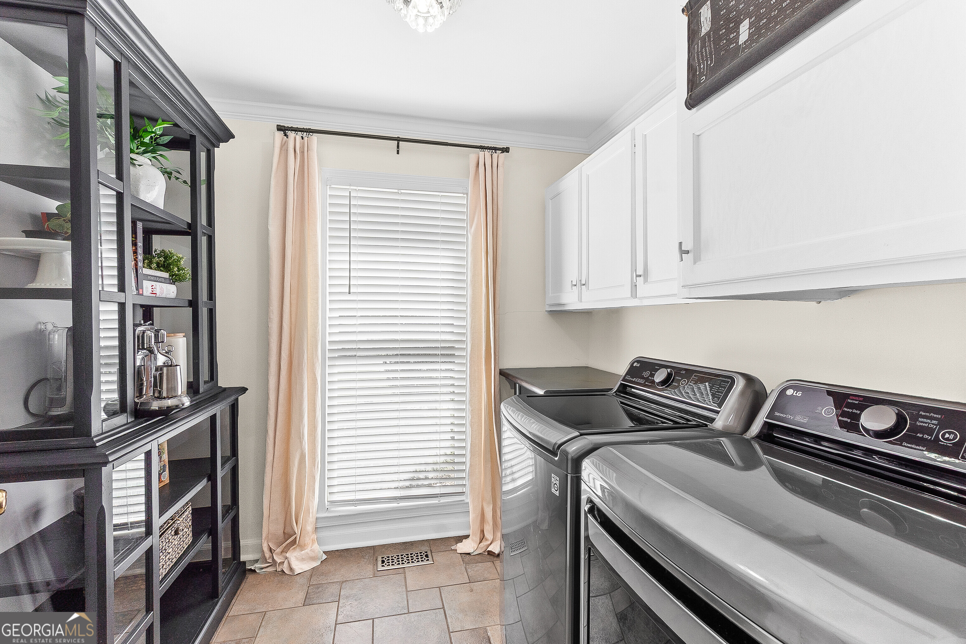 206 Huntington Court Macon, GA 31210 - Photo 14 of 27 a view of a storage and utility room in a kitchen