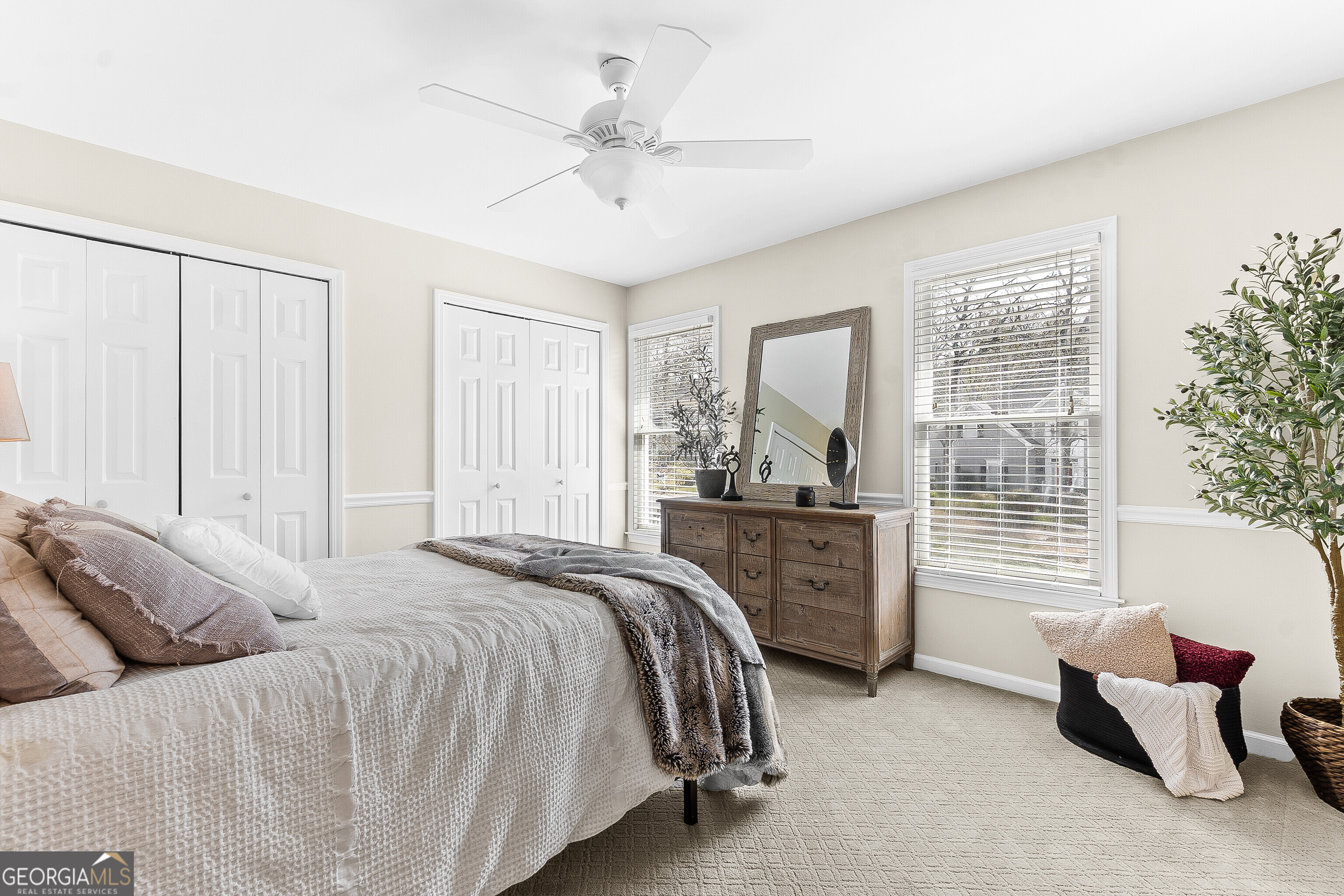 206 Huntington Court Macon, GA 31210 - Photo 21 of 27 a bed room with a bed and a window