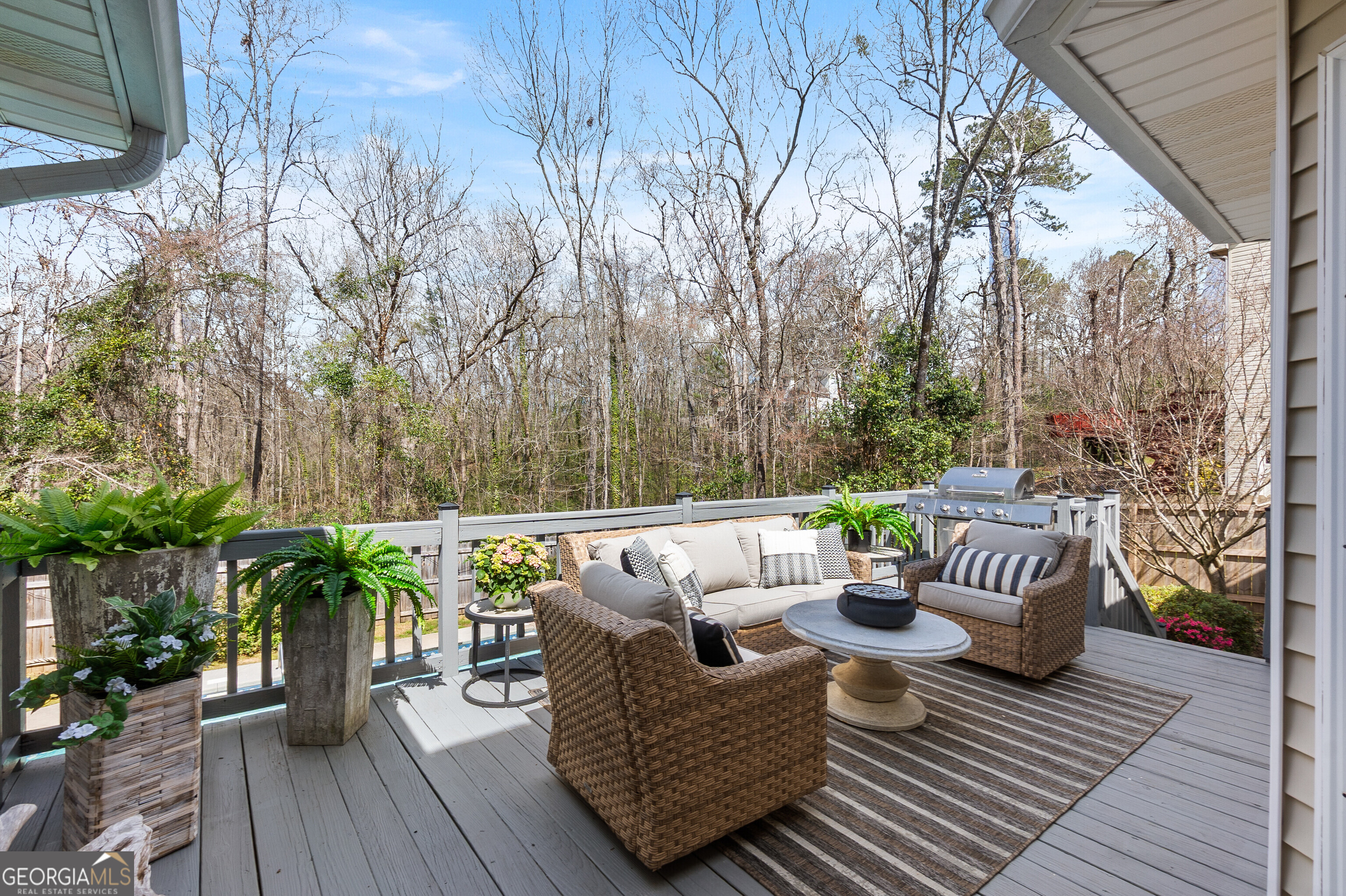 206 Huntington Court Macon, GA 31210 - Photo 26 of 27 a view of balcony with couch and wooden floor