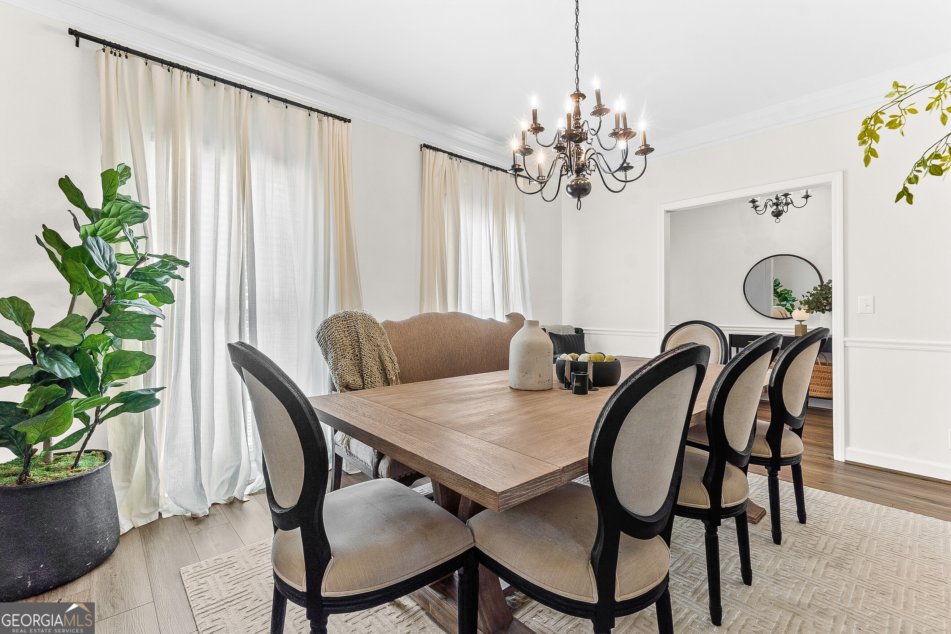 206 Huntington Court Macon, GA 31210 - Photo 5 of 27 a view of a dining room with furniture and chandelier