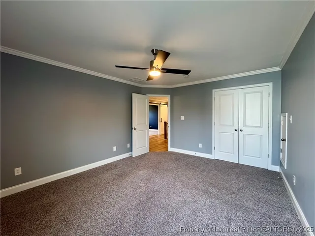a view of an empty room with window