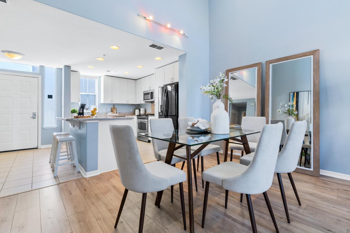 3901 Lick Mill Boulevard, Unit 407 Santa Clara, CA 95054 - Photo 12 of 39 a dining room with furniture and wooden floor