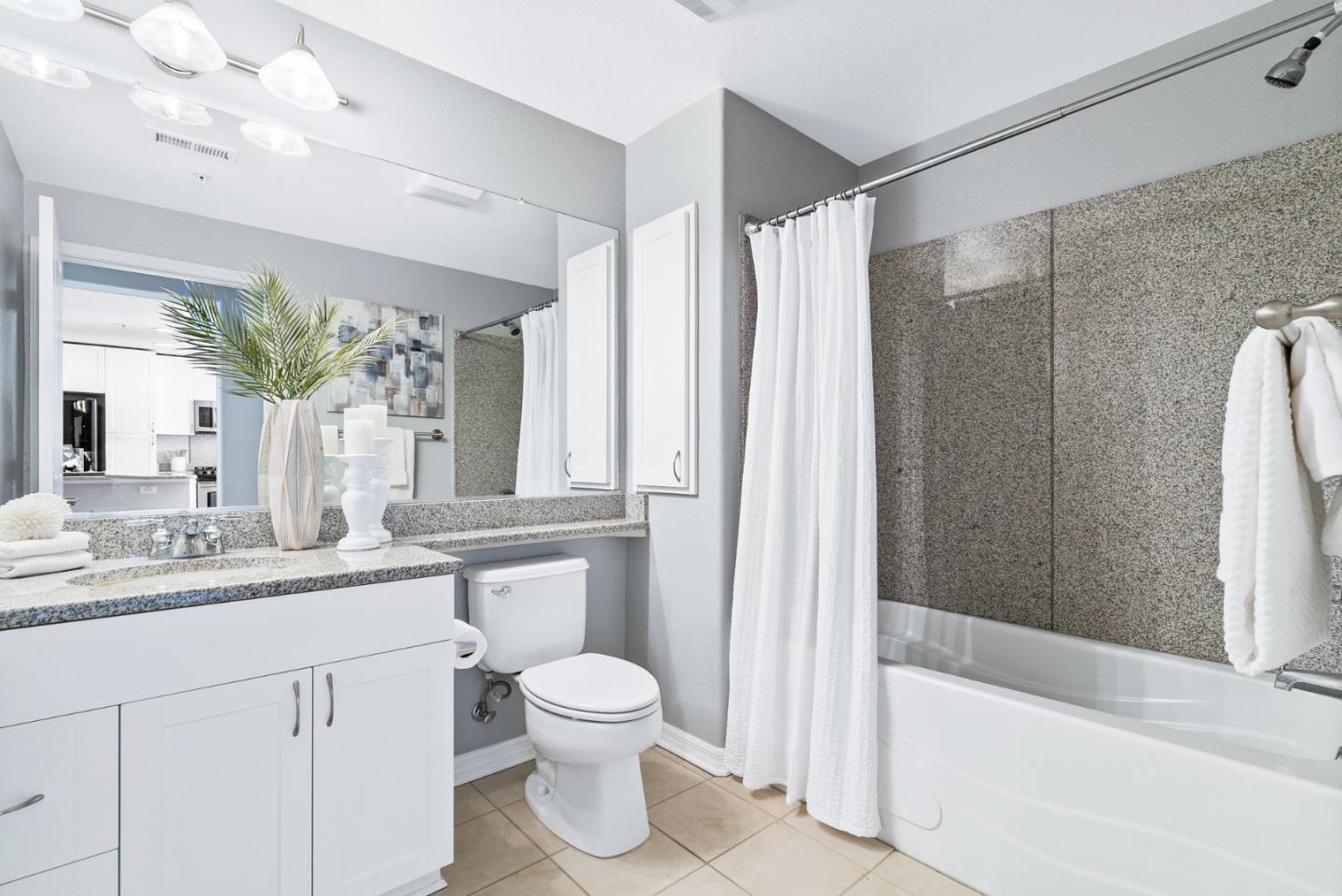 3901 Lick Mill Boulevard, Unit 407 Santa Clara, CA 95054 - Photo 24 of 39 a bathroom with a sink a toilet and a bathtub