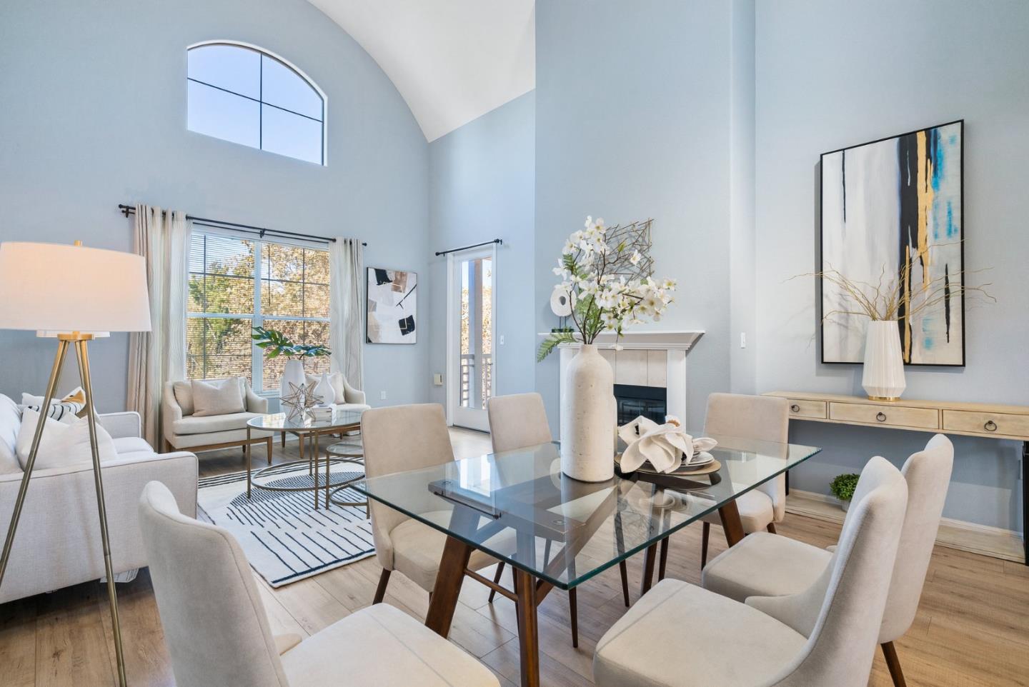 3901 Lick Mill Boulevard, Unit 407 Santa Clara, CA 95054 - Photo 9 of 39 a living room with furniture a fireplace and a large window