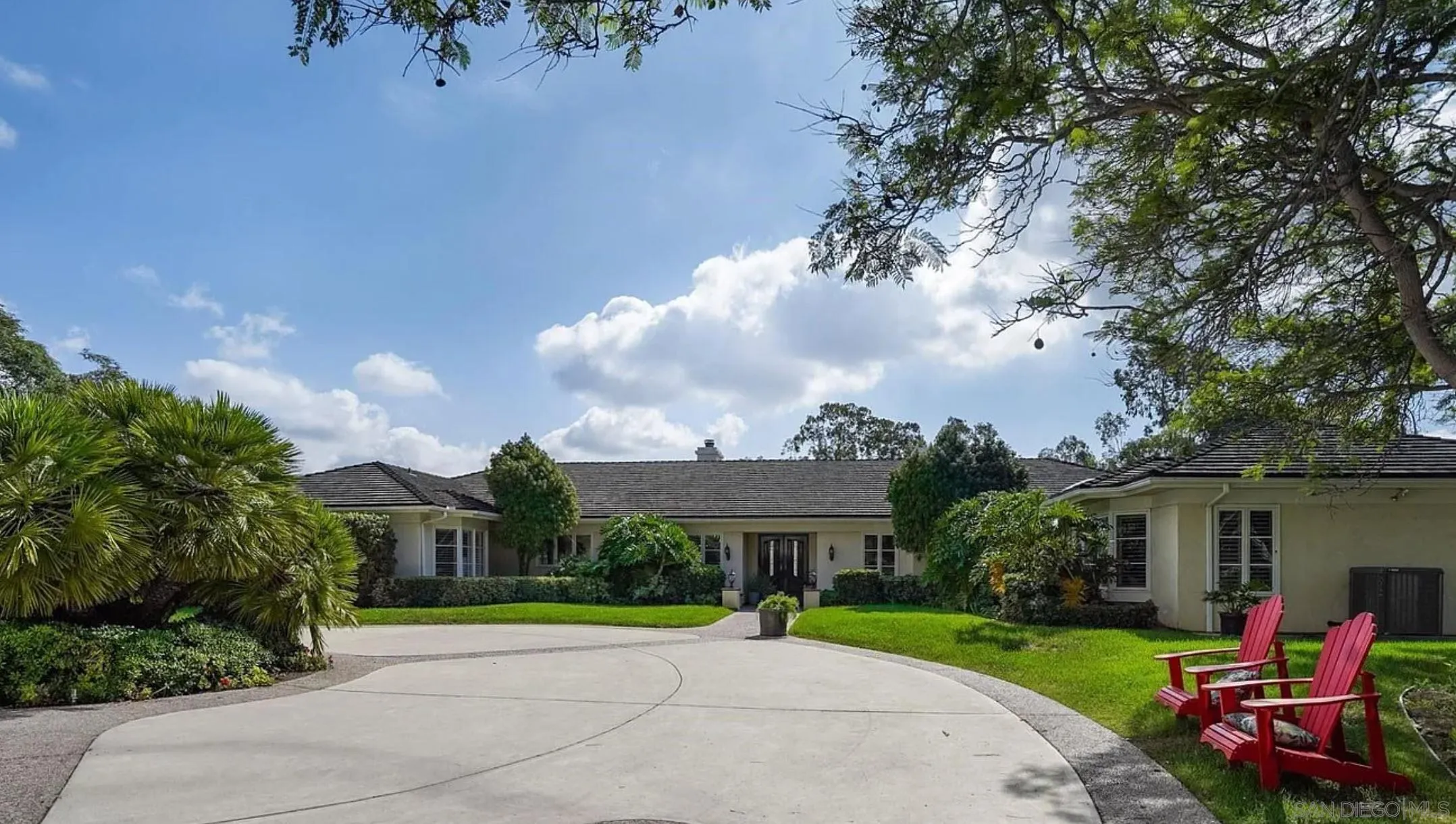 4701 El Mirar Rancho Santa Fe, CA 92067 - Photo 3 of 9 a front view of a house with garden