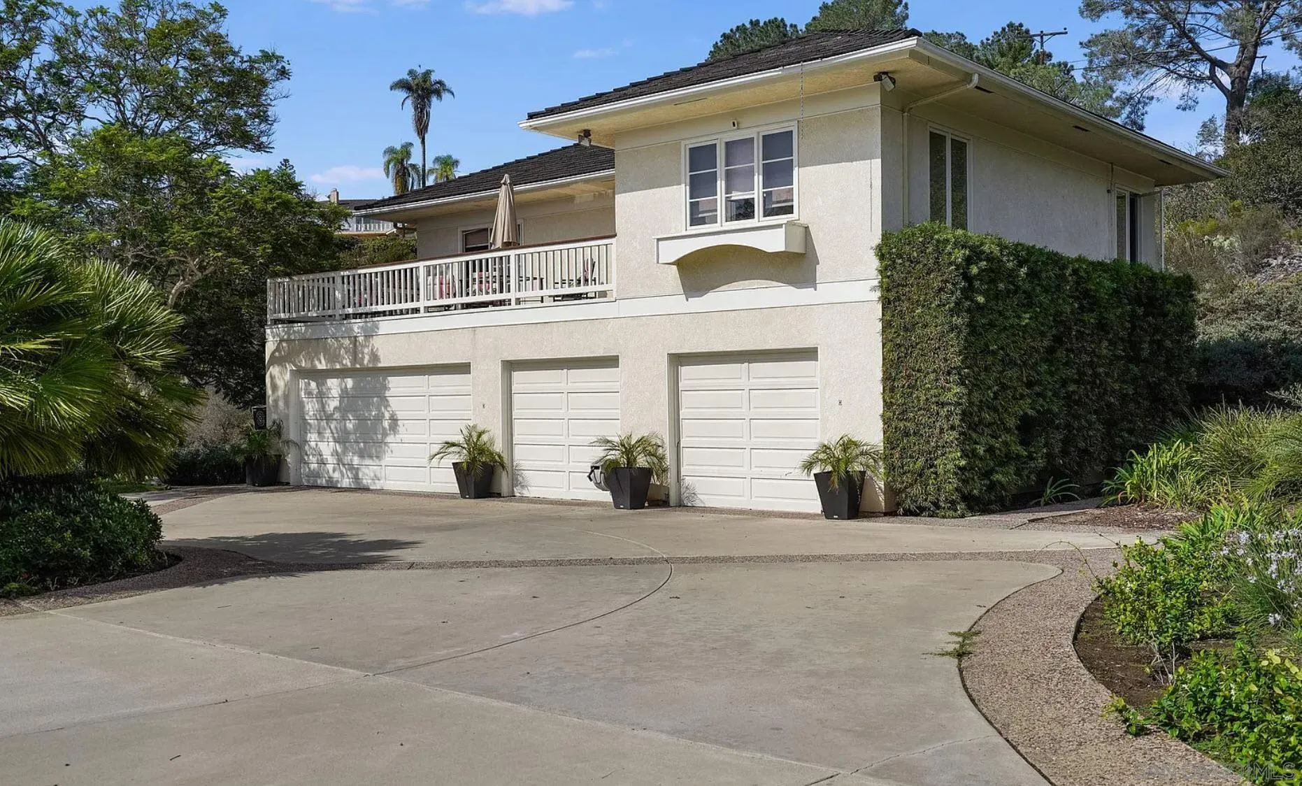 4701 El Mirar Rancho Santa Fe, CA 92067 - Photo 7 of 9 front view of a house with a street