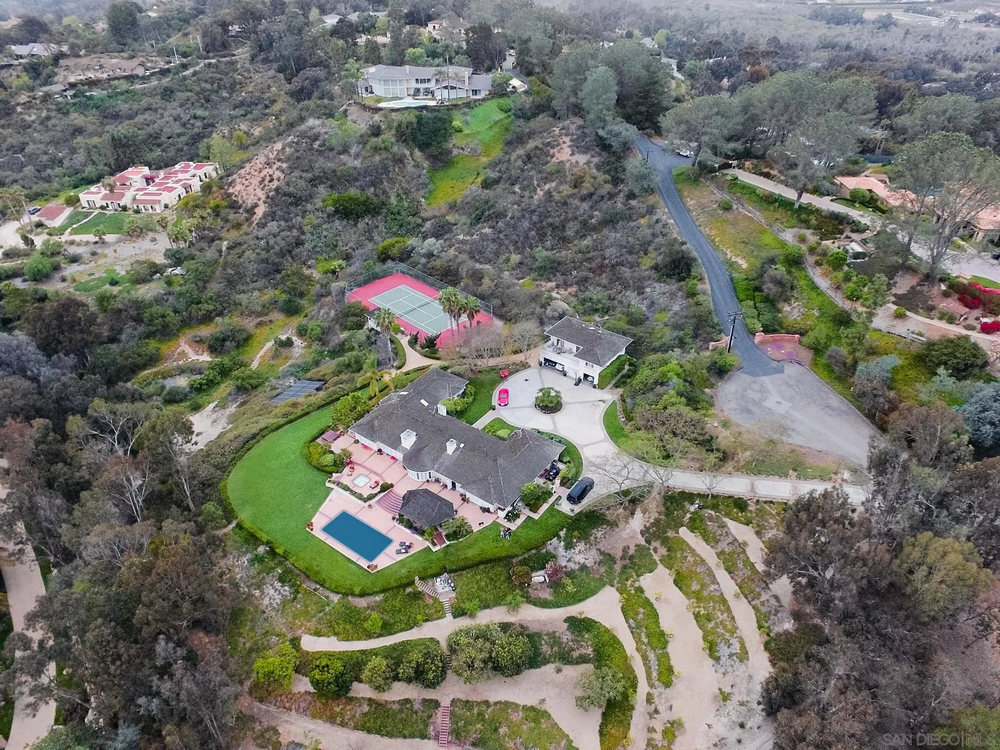 4701 El Mirar Rancho Santa Fe, CA 92067 - Photo 9 of 9 an aerial view of a house with a garden and swimming pool