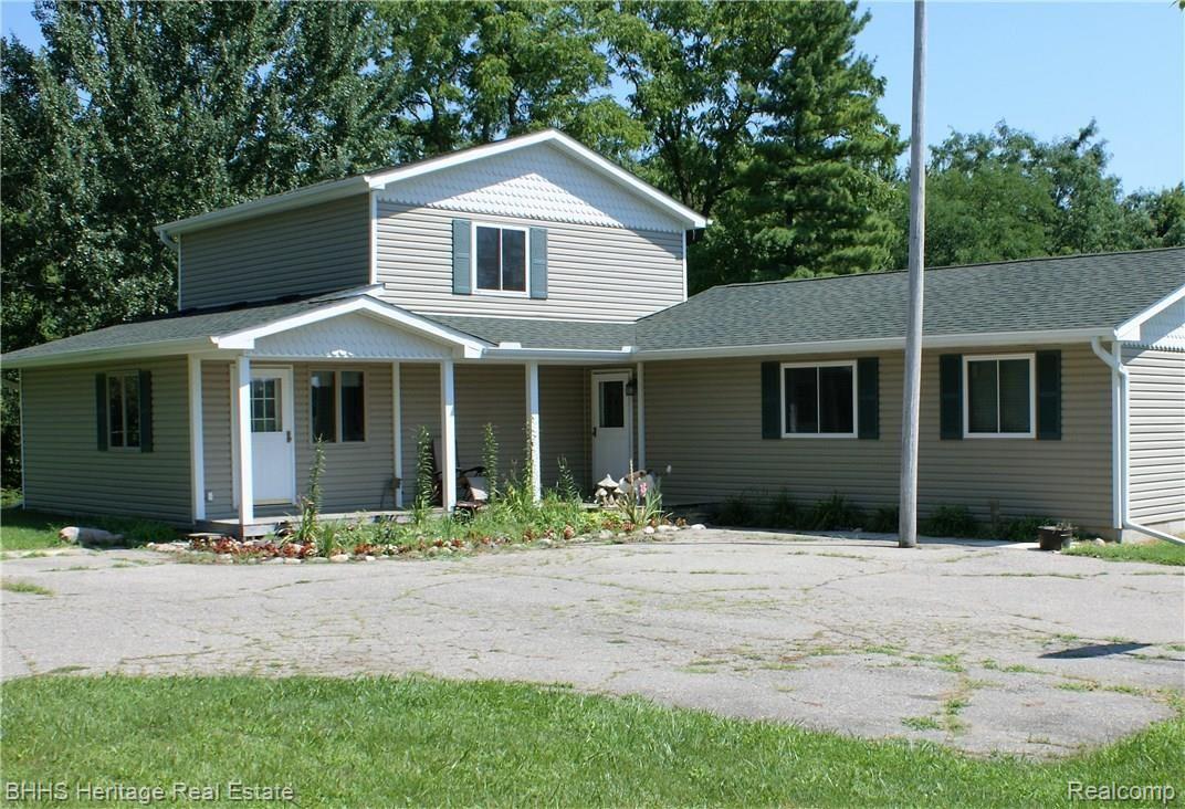 1874 Wallace Road Webberville, MI 48892 - Photo 1 of 7 Front of Home
