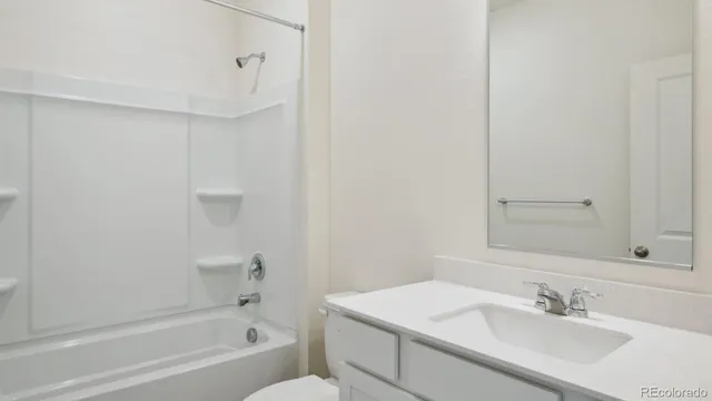 a bathroom with a sink and a bathtub