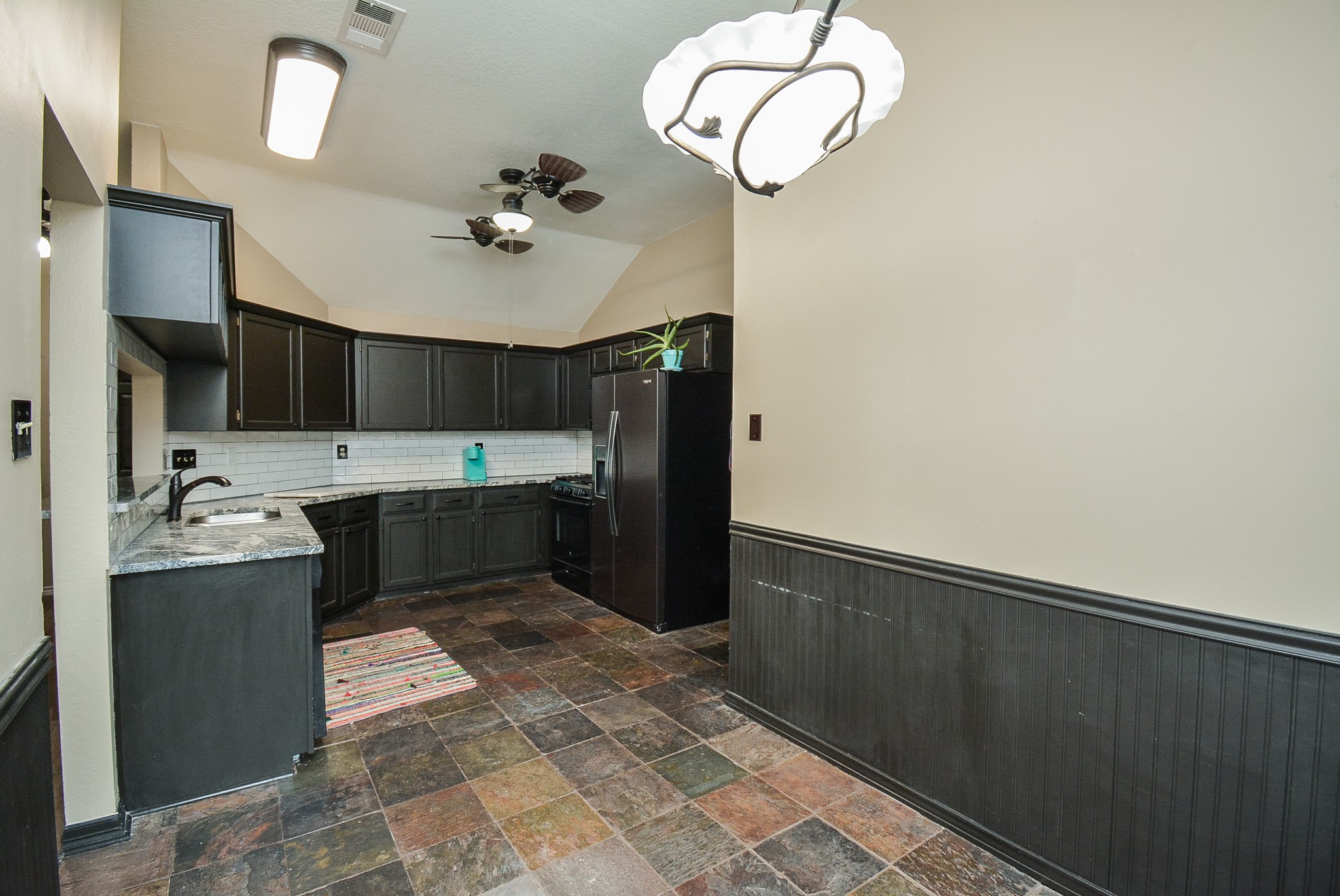 23734 Canyon Lake Drive Spring, TX 77373 - Photo 12 of 32 a kitchen with a sink cabinets and window