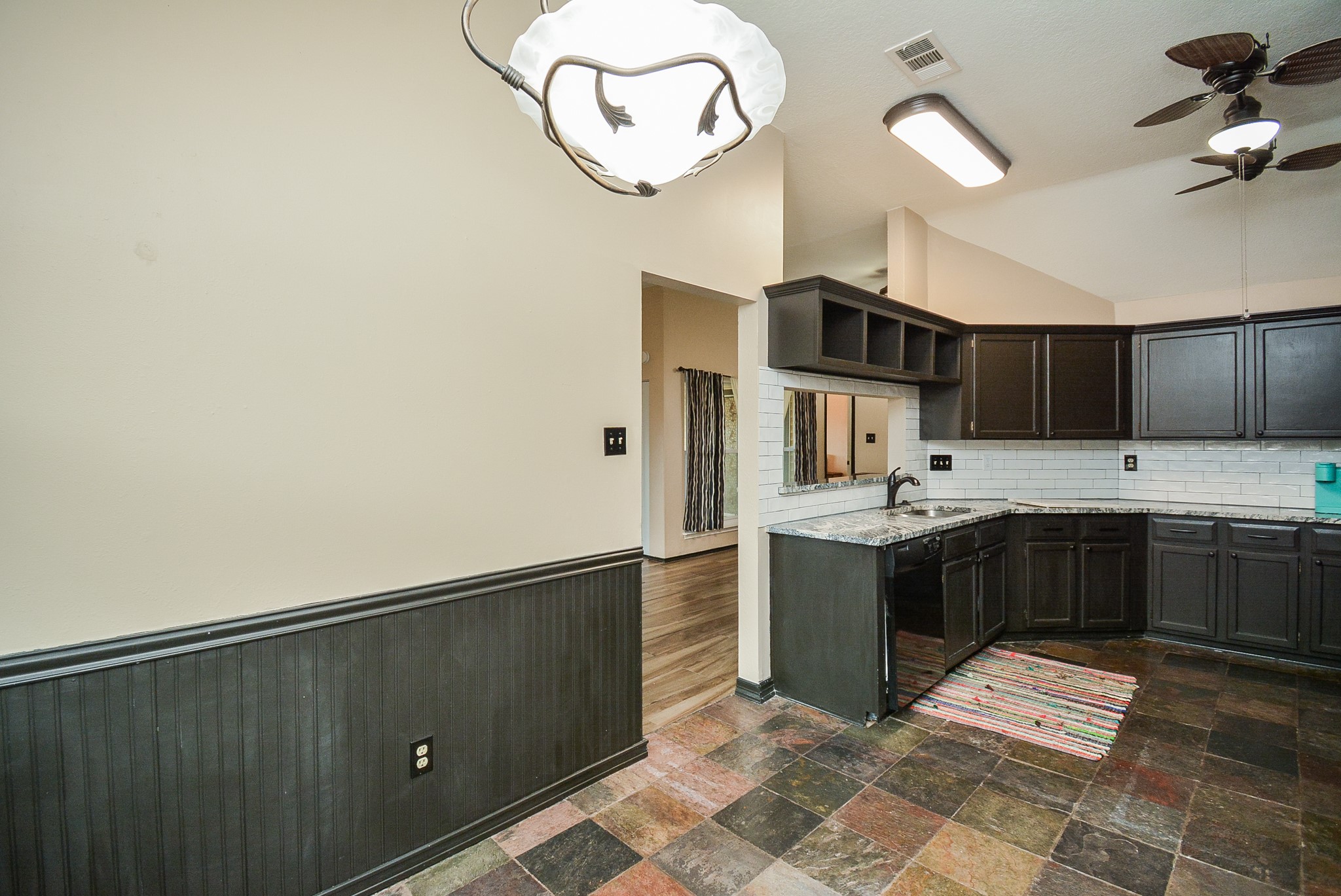 23734 Canyon Lake Drive Spring, TX 77373 - Photo 13 of 32 a kitchen with stainless steel appliances granite countertop a refrigerator and a stove top oven