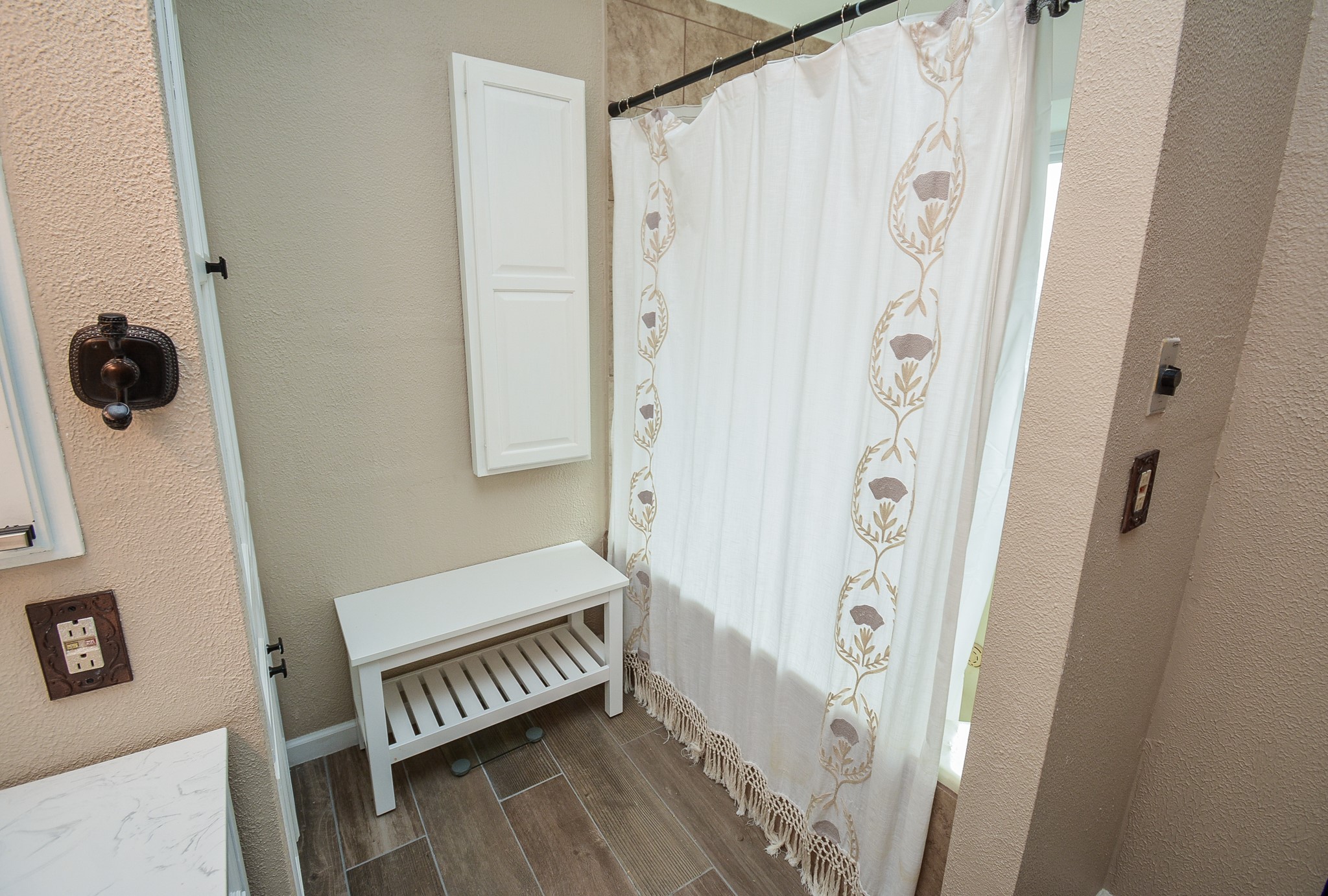 23734 Canyon Lake Drive Spring, TX 77373 - Photo 18 of 32 a bathroom with a shower and a sink