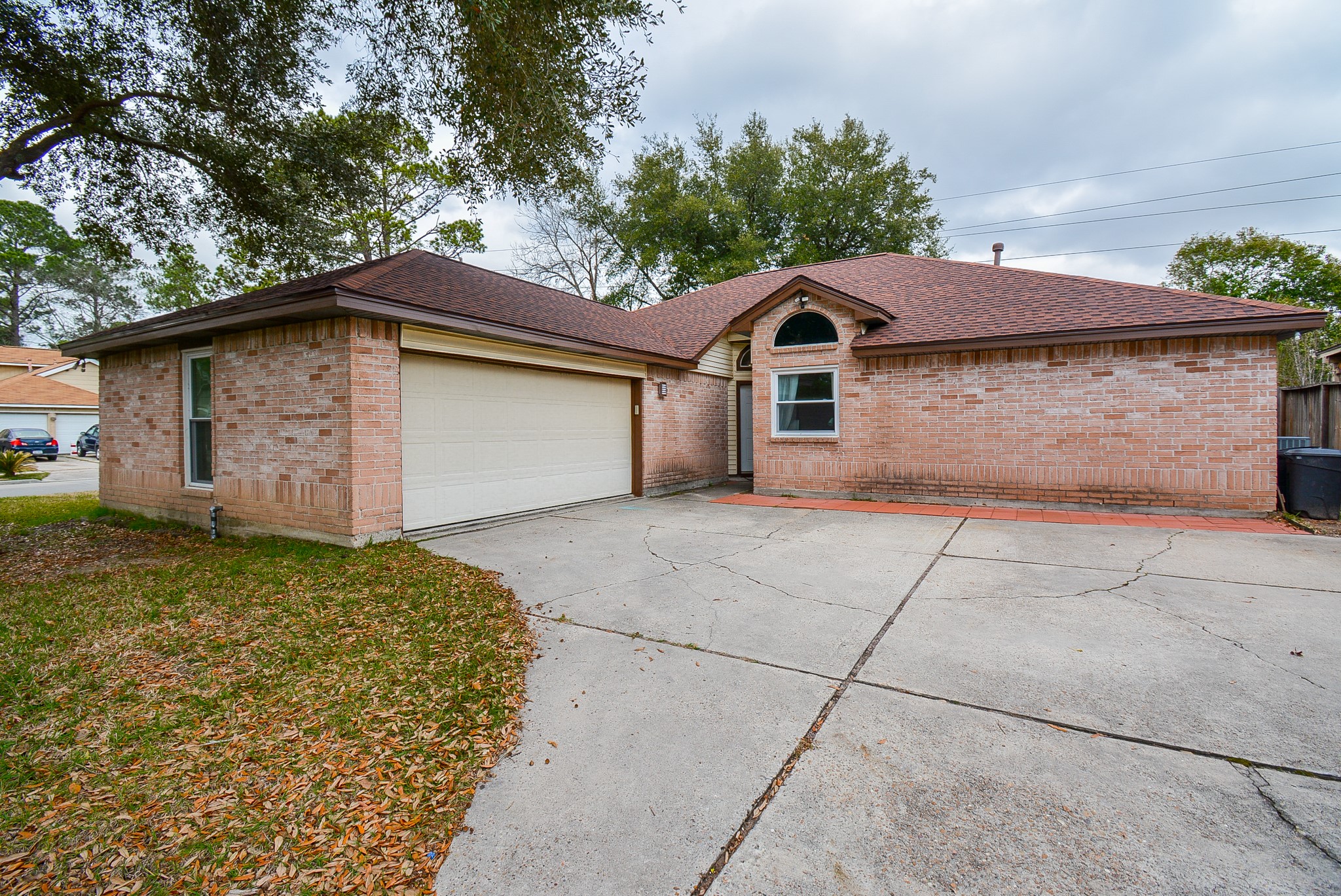 23734 Canyon Lake Drive Spring, TX 77373 - Photo 2 of 32 a view of a house with a yard