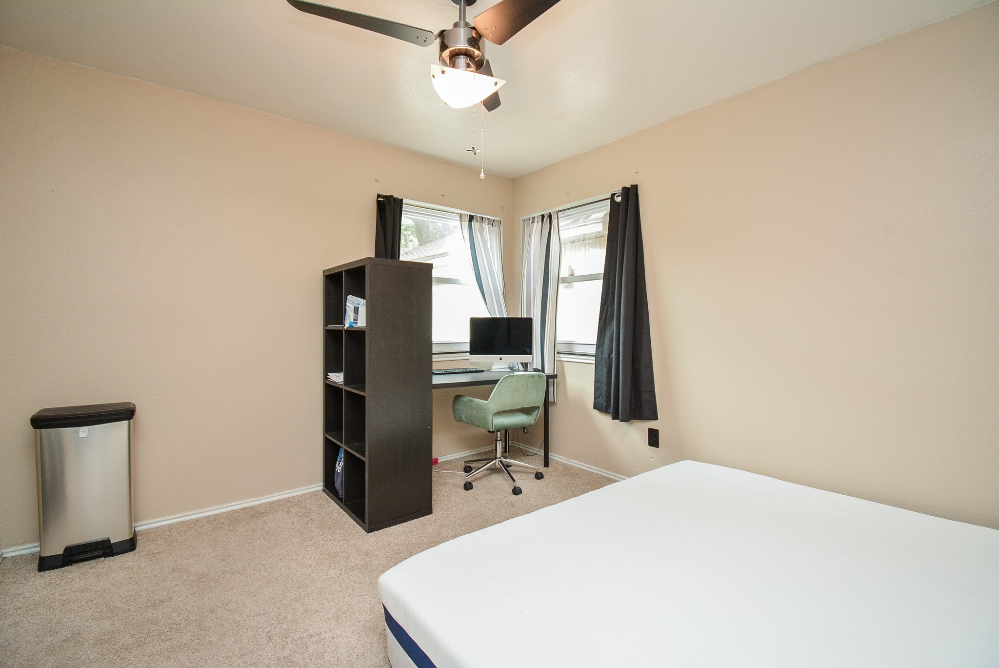 23734 Canyon Lake Drive Spring, TX 77373 - Photo 22 of 32 a room with a bed and a television
