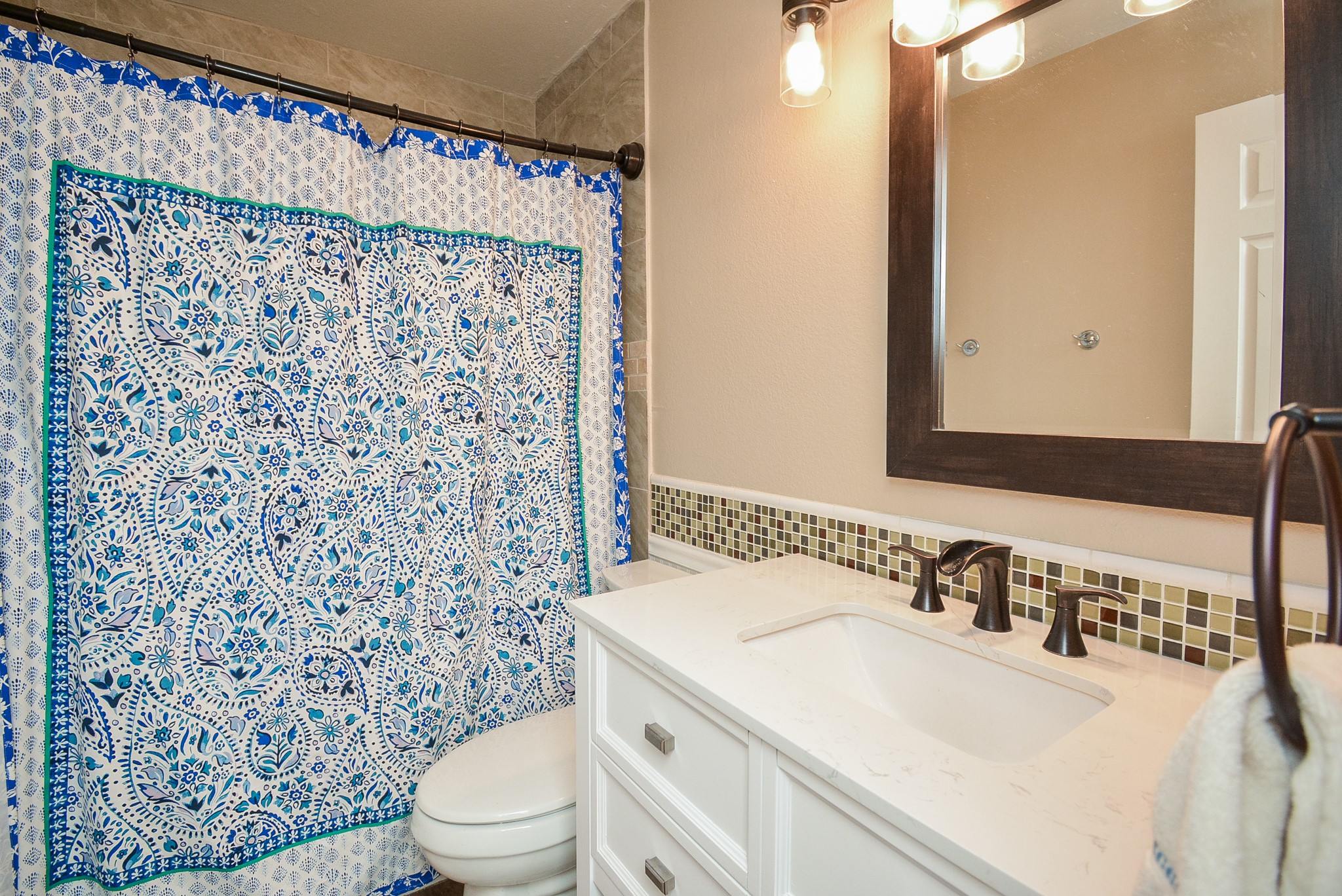 23734 Canyon Lake Drive Spring, TX 77373 - Photo 25 of 32 a bathroom with a sink toilet and shower