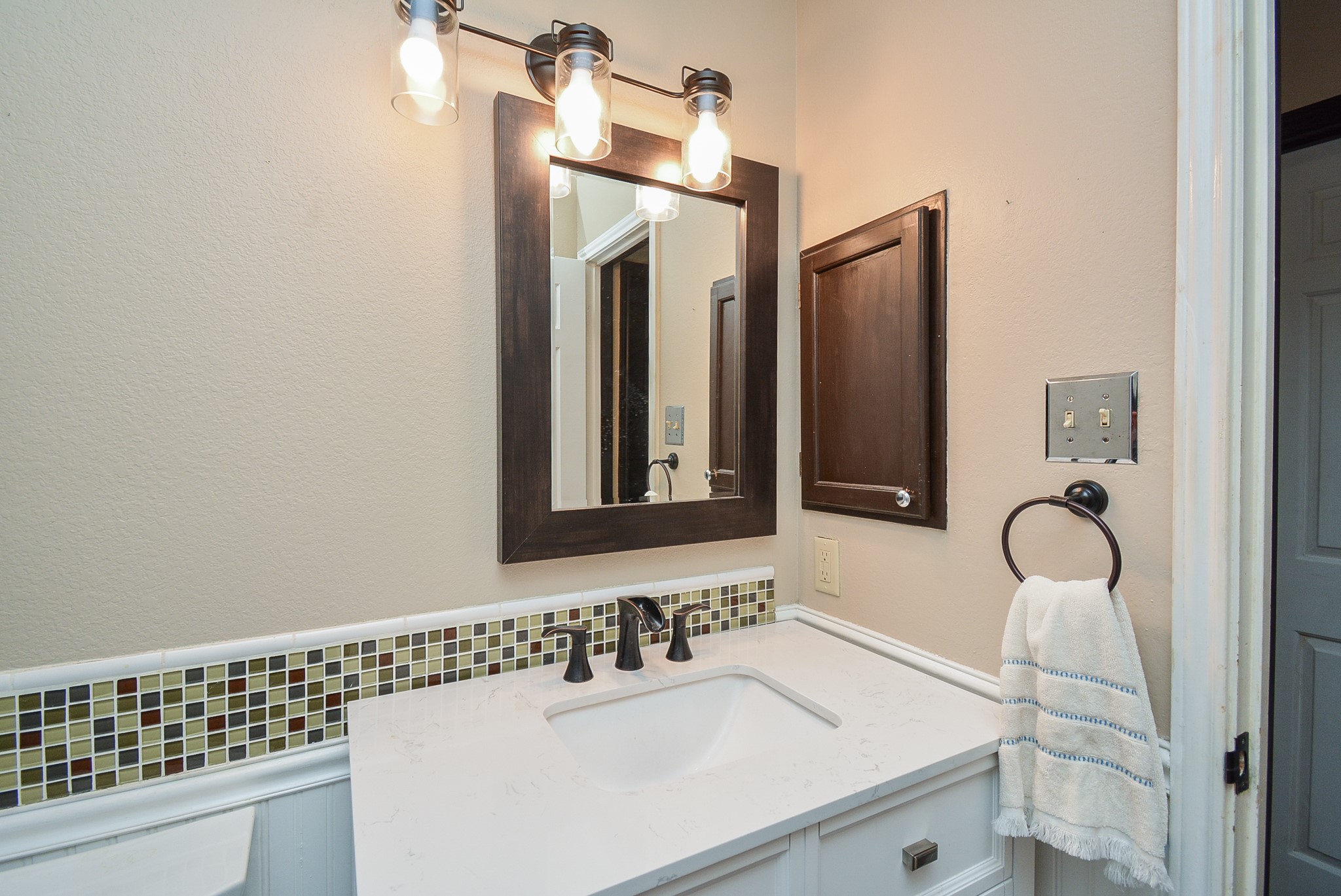 23734 Canyon Lake Drive Spring, TX 77373 - Photo 26 of 32 a bathroom with a sink and a mirror