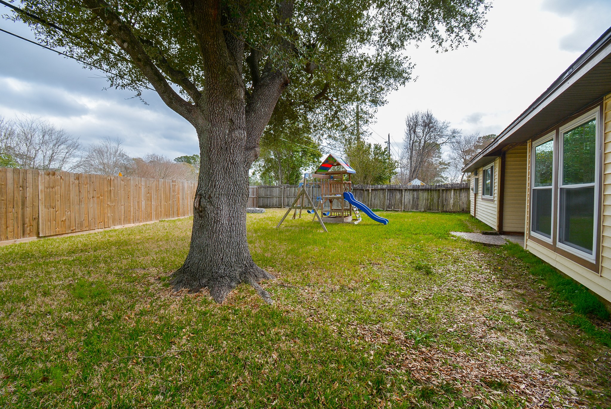23734 Canyon Lake Drive Spring, TX 77373 - Photo 30 of 32 a view of a garden with a slide