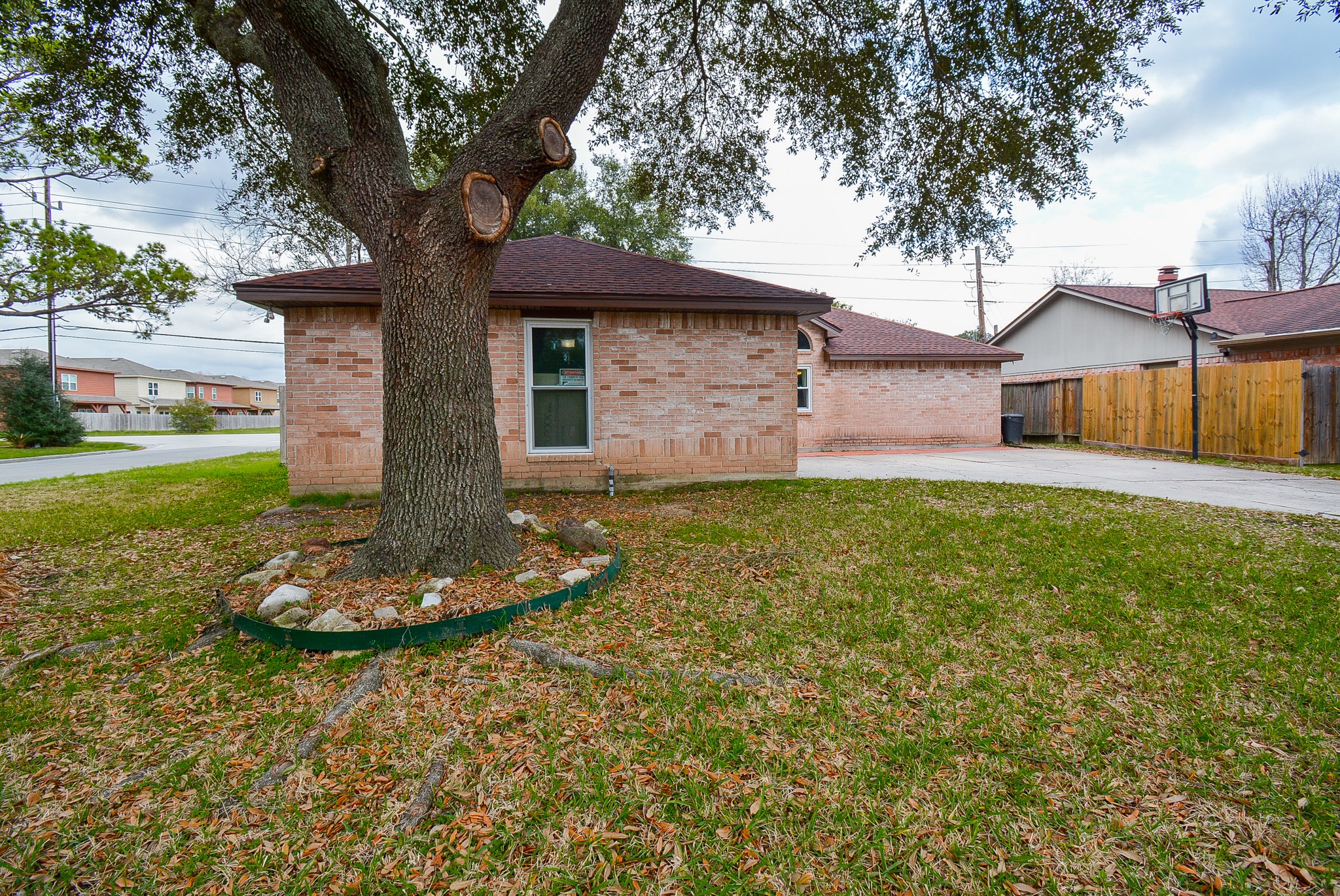 23734 Canyon Lake Drive Spring, TX 77373 - Photo 3 of 32 a front view of a house with a yard and garage