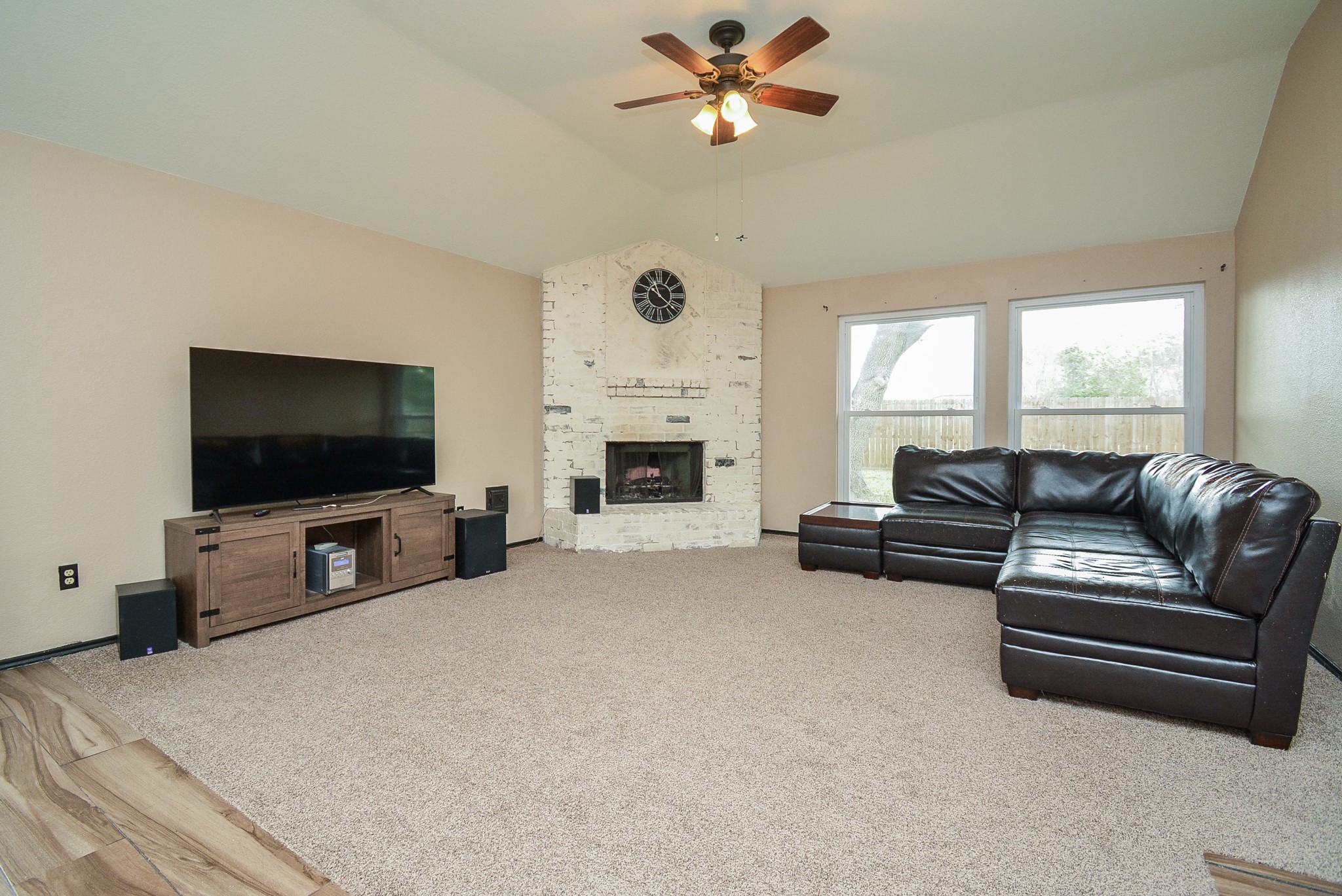 23734 Canyon Lake Drive Spring, TX 77373 - Photo 7 of 32 a living room with furniture and a flat screen tv