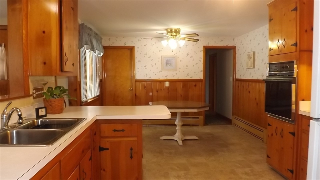 48 Ernest Avenue Worcester, MA 01604 - Photo 9 of 41 a bathroom with a sink a toilet and shower