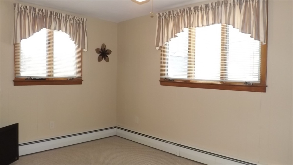 48 Ernest Avenue Worcester, MA 01604 - Photo 10 of 41 an empty room with a window