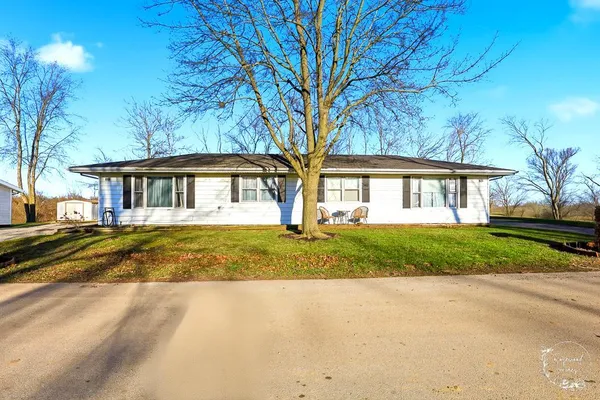 a view of a house with a swimming pool
