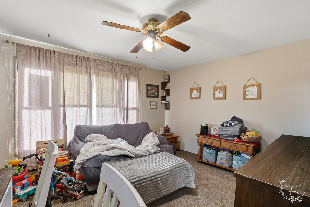 618-620 South Main Street Grant Park, IL 60940 - Photo 12 of 21 a bedroom with a bed and a window