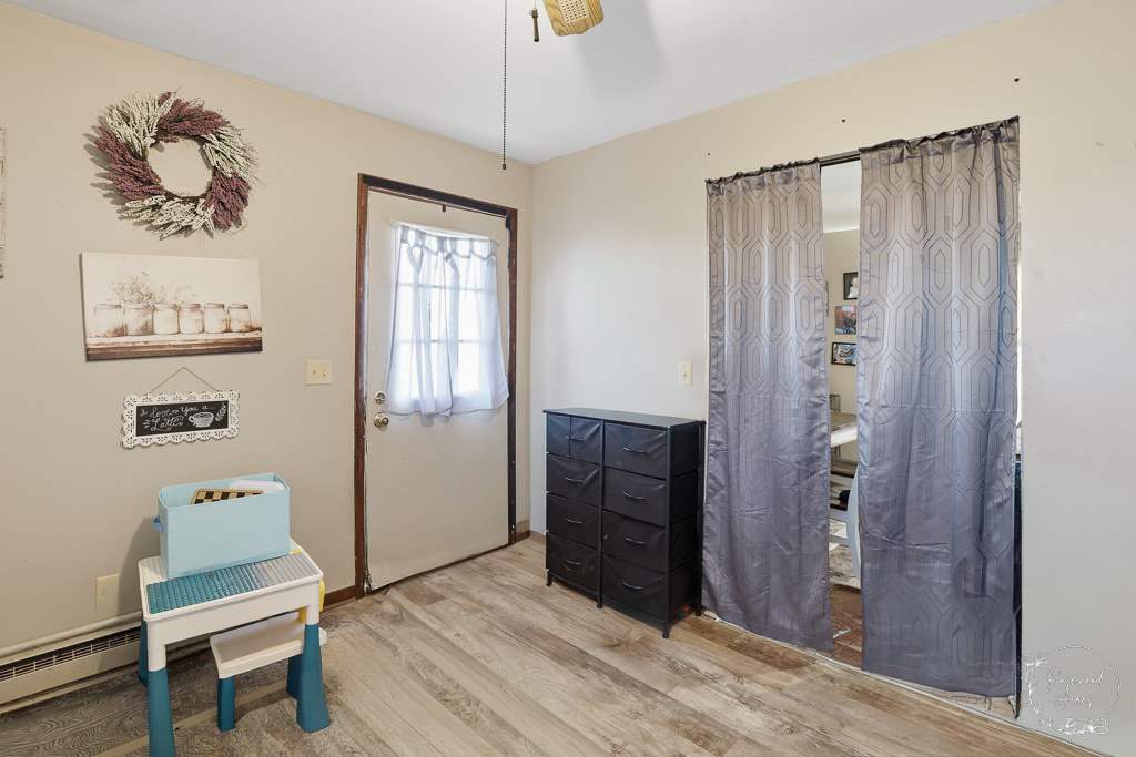 618-620 South Main Street Grant Park, IL 60940 - Photo 18 of 21 a bedroom with a bed and a table in it