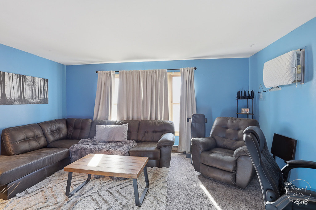 618-620 South Main Street Grant Park, IL 60940 - Photo 4 of 21 a living room with furniture and a large window