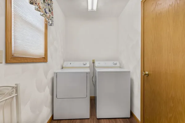 a utility room with dryer and washer