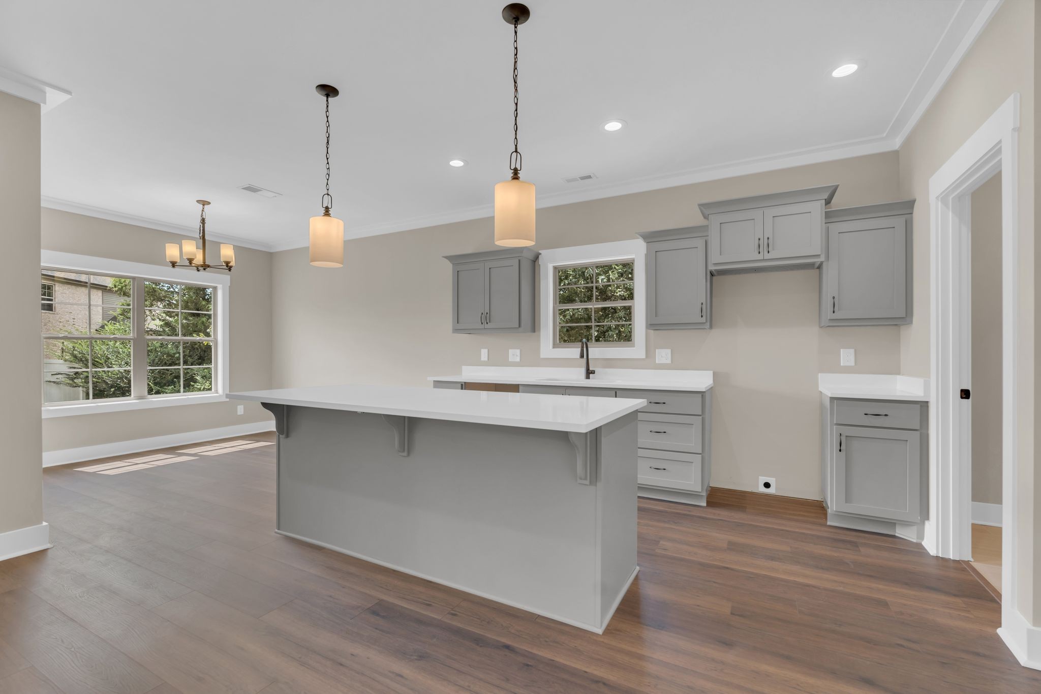 1170 Rimrock Road Smyrna, TN 37167 - Photo 12 of 33 a kitchen with kitchen island a sink stove and wooden floor
