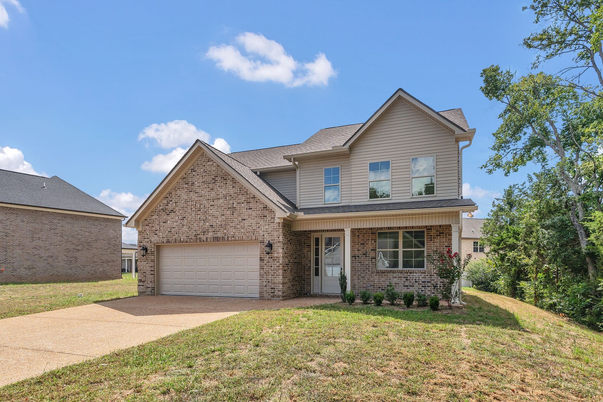1170 Rimrock Road Smyrna, TN 37167 - Photo 3 of 33 a front view of a house with a yard and garage