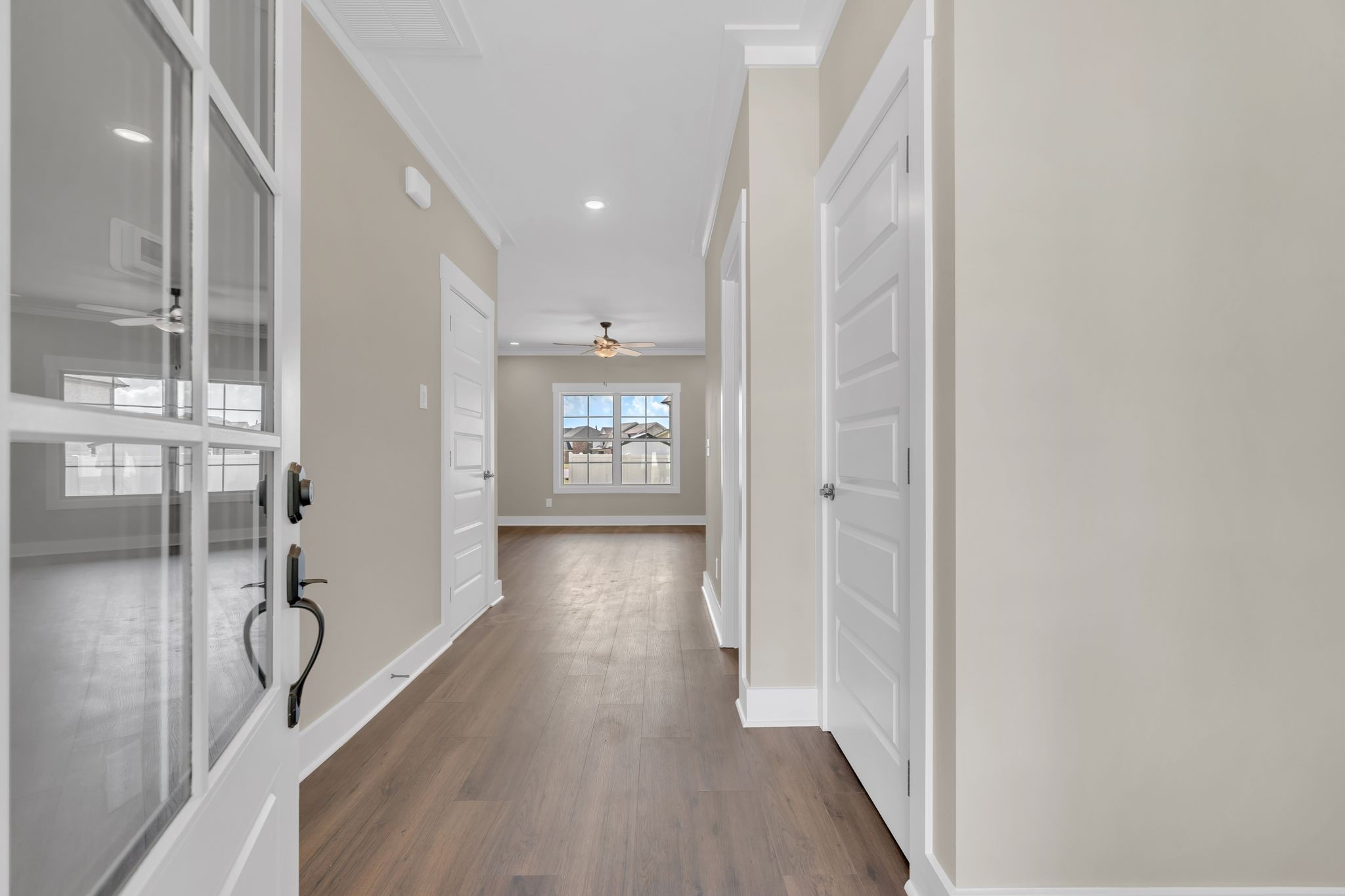 1170 Rimrock Road Smyrna, TN 37167 - Photo 4 of 33 a view of a hallway with wooden floor and windows