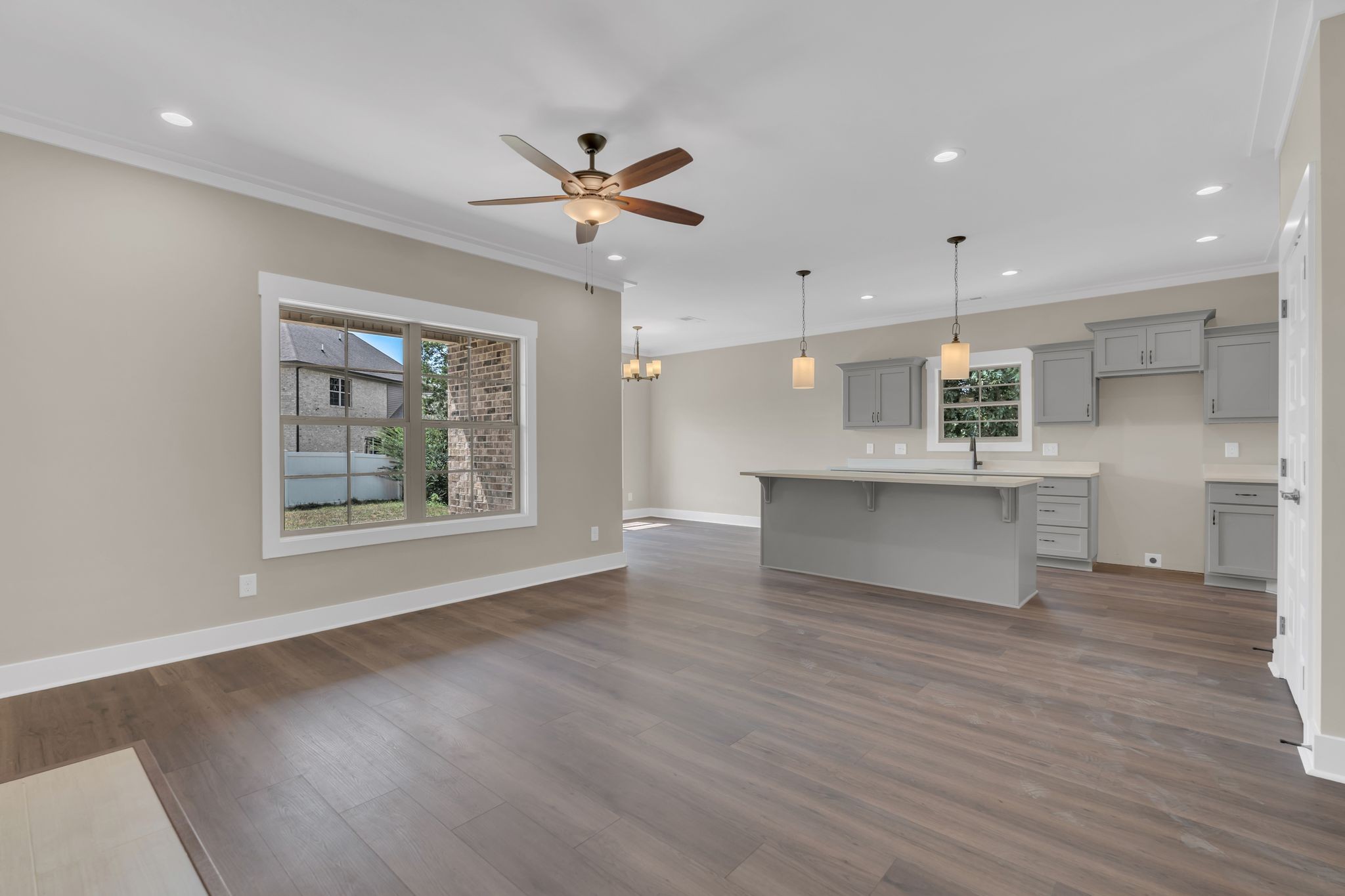1170 Rimrock Road Smyrna, TN 37167 - Photo 6 of 33 a view of an empty room with wooden floor and a window
