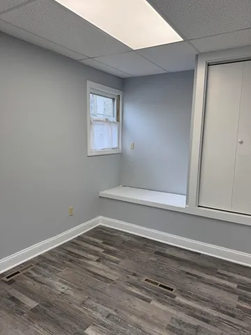 a view of an empty room and window